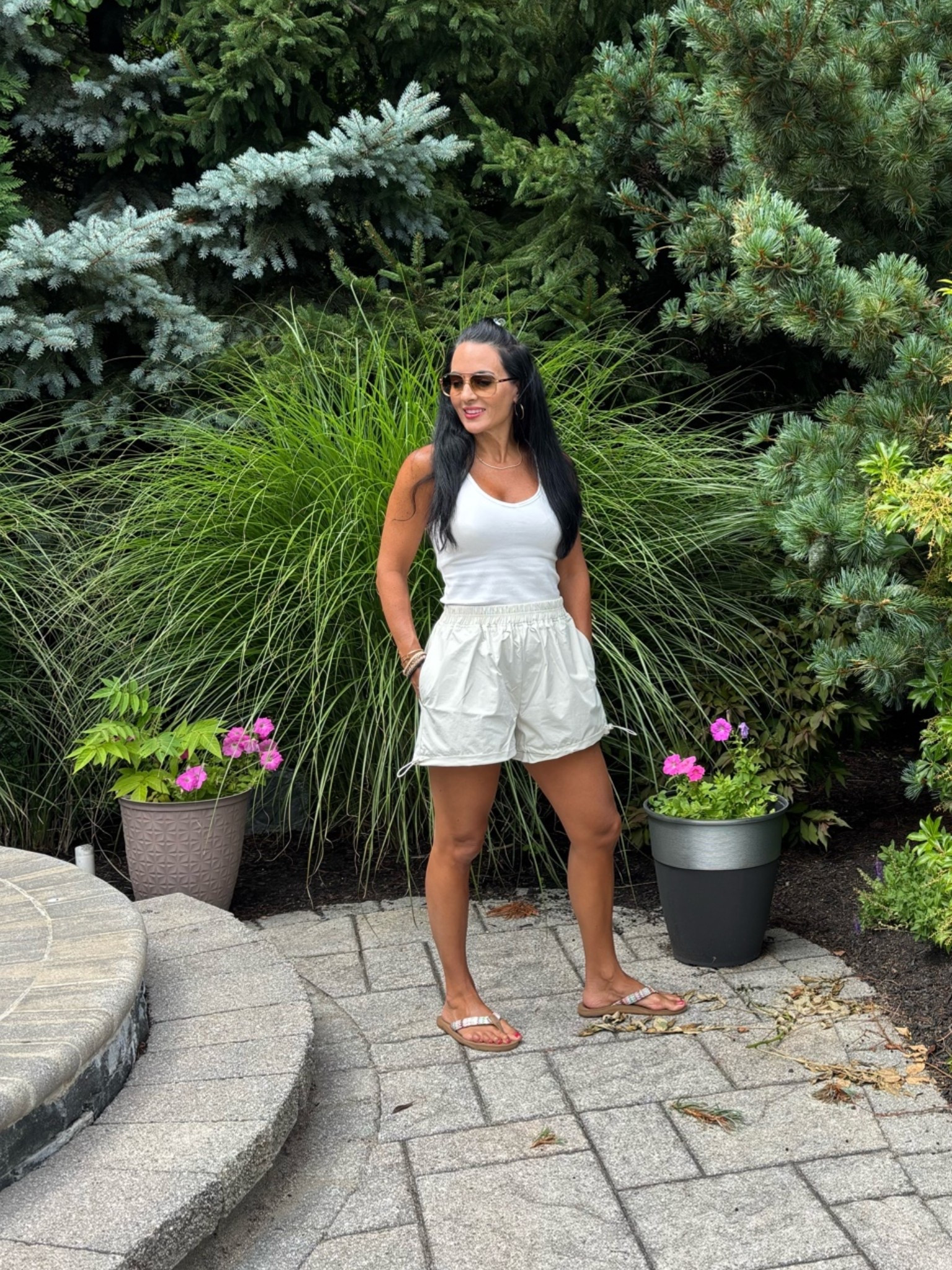 Amazon nylon athletic shorts 
Amazon tank top with built in bra 

Flip flops and sunglasses 
Sports mom, errands and more

#LTKootd #LTKfitnessgoals #LTKActive