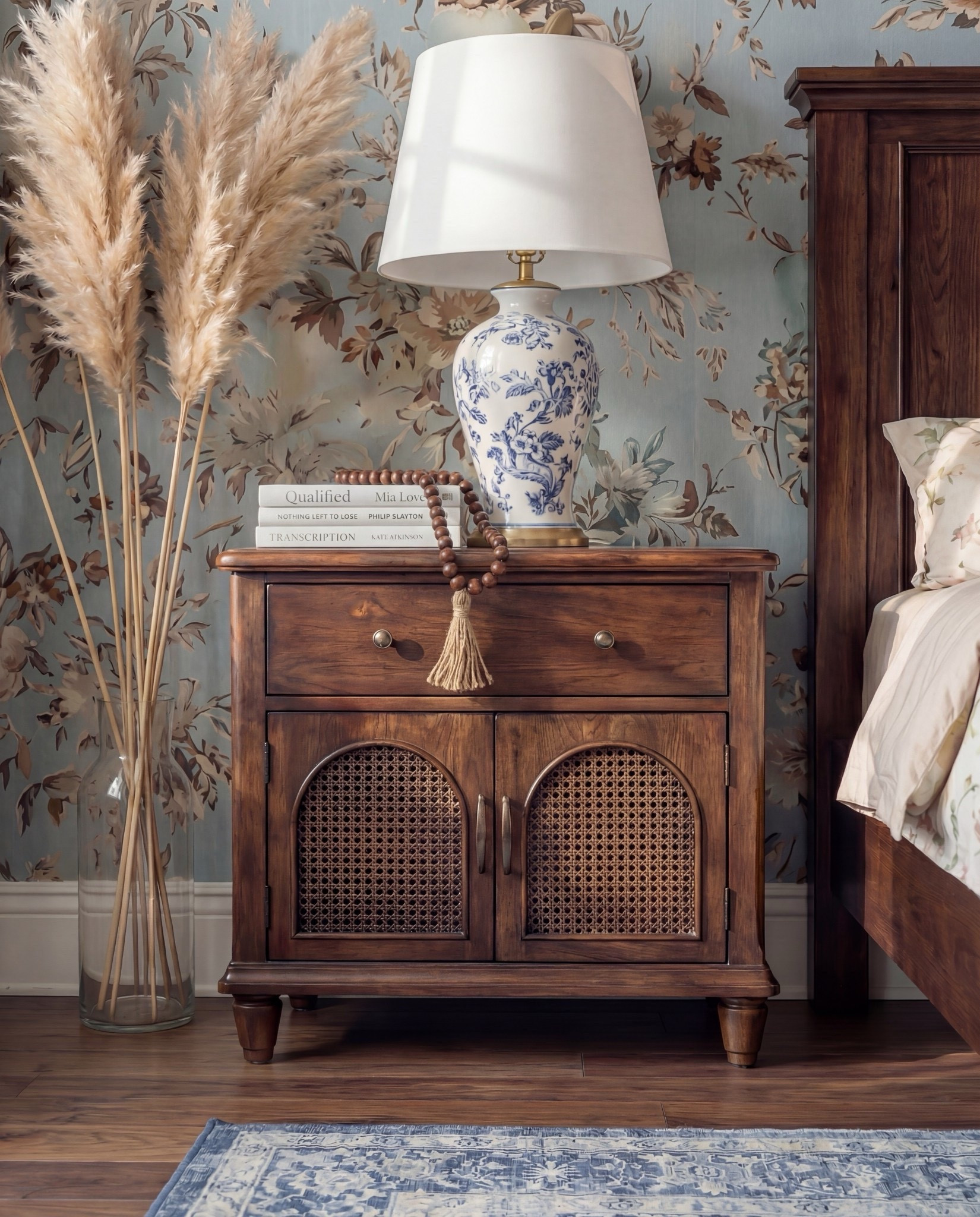 Shop the Look:
• Blue floral wallpaper
• Dark wood bed frame
• Chunky knit blue throw
• Blue patterned area rug
• Cream upholstered bench
• Blue + cream accent pillows
• Chinoiserie-style ceramic table lamps
• Pampas stems for softness
White decor books
Brown decor beads 



#LTKFindsUnder100 #LTKSaleAlert #LTKHome