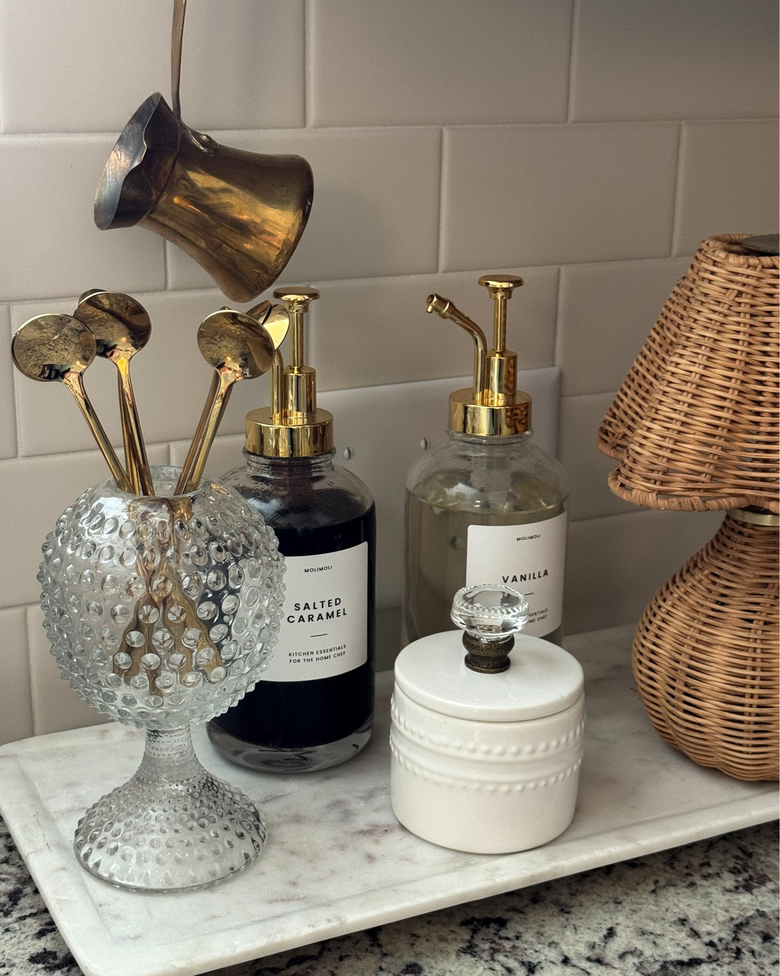 The possibilities are endless with these adorable vintage hobnail Ivy bowls. I was able to source quite a few of them…even some colorful ones.

Vintage Ivy bowls, marble tray, gold coffee spoons, brass espresso pourers, syrup pumps, sugar container, console table, vintage wood tray, matches, upholstered chair, floor lamp with woven shade, woven storage boxes, black candelabra, gold wick trimmer, rechargeable woven lamp

#LTKSeasonal #LTKstorytime #LTKHome