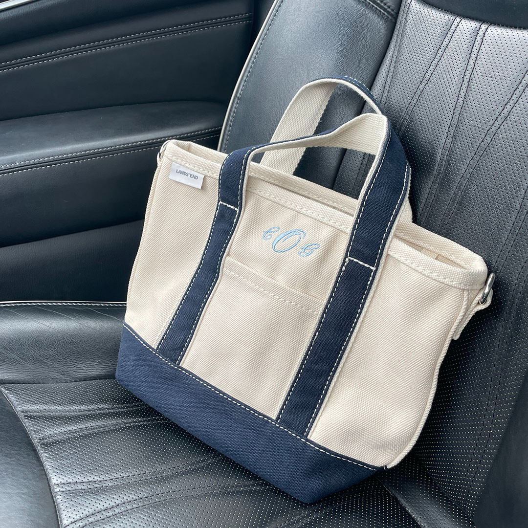 Loving this little mini tote bag for travel, the gym and casual days. It fits my water bottle yet offers a small, non-bulky silhouette. Two interior pockets, a key holder, and exterior pocket. Love it! 

 #LTKActive #LTKFindsUnder50 #LTKTravel