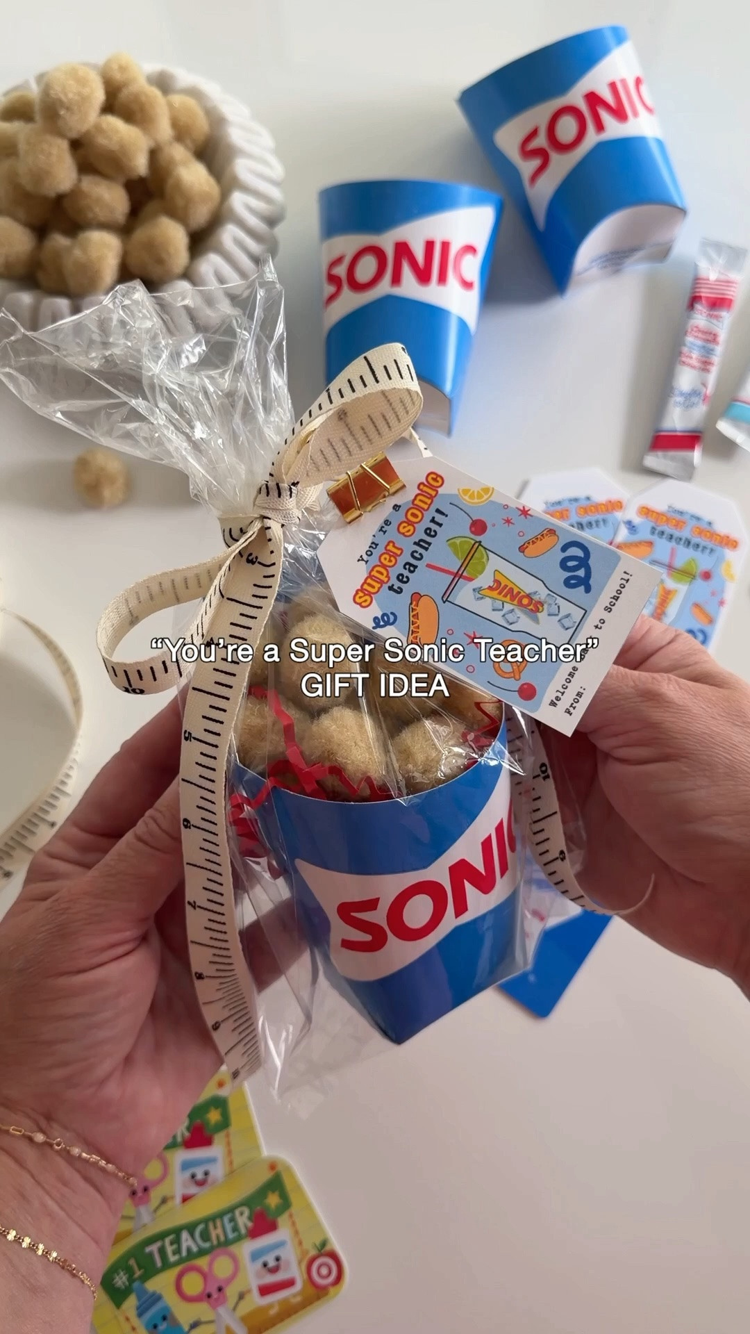 Back to School Teacher Gift Idea 

I went to my local Sonic & asked for medium size tot cups with my gift cards. I filled the cups with paper shreds & mimic’d tots eith pom poms. I also added a Target gift card :)

#LTKSeasonal #LTKmomlife