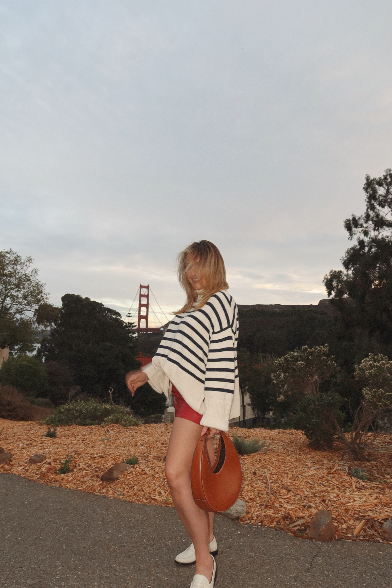 GAP SWEATER
REVOLVE SKIRT
SAINT LAURENT LOAFERS ON SALE AT CETTIRE
STAUD MOON BAG 

#LTKmidsize #LTKstyletip #LTKitbag