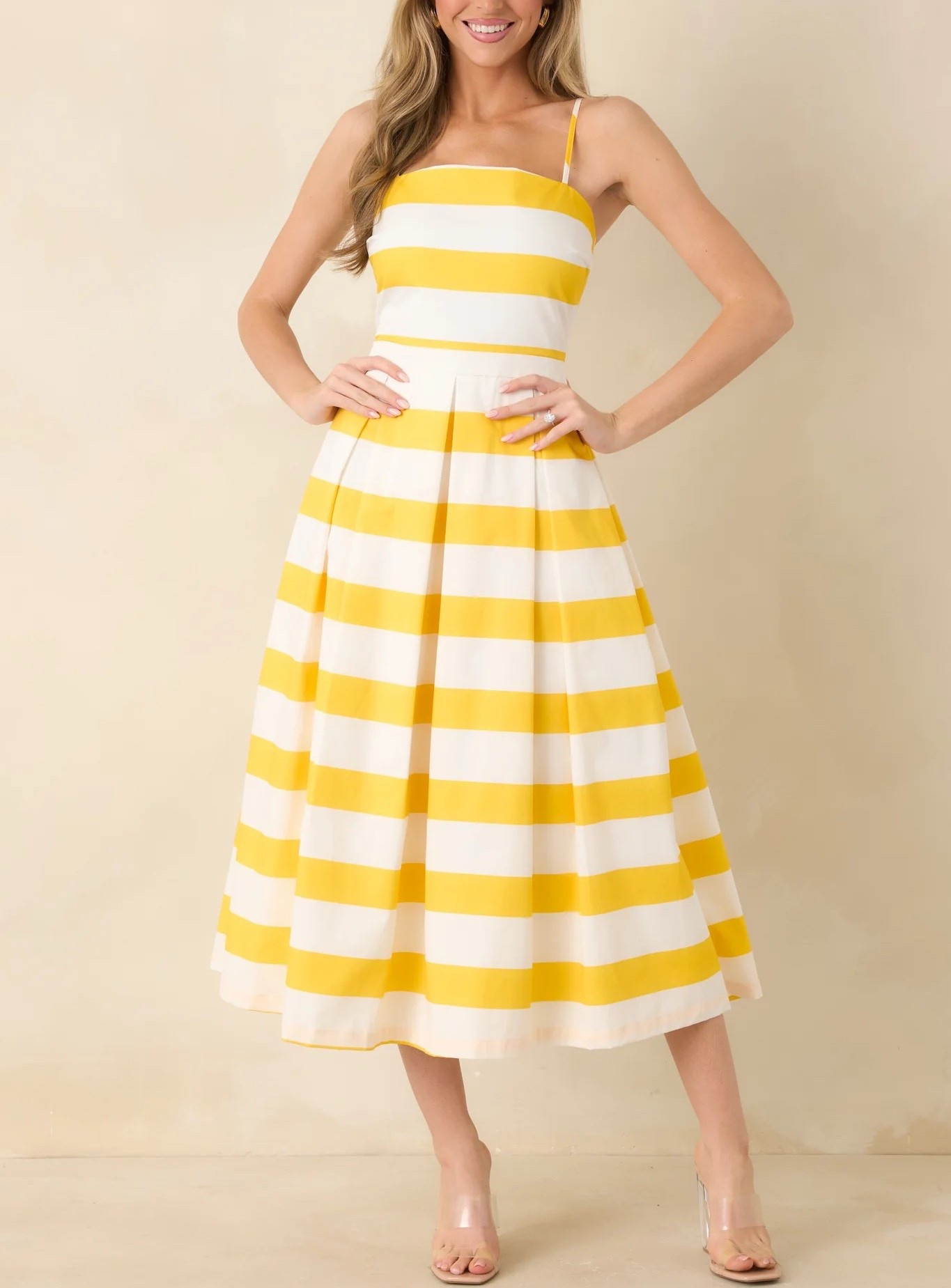 Bright, cheerful, and effortlessly flattering, the Couldn’t Be Happier Yellow Stripe Cotton Sleeveless Midi Dress is made for sunny days and feel-good moments. Under $100.

Keywords: Garden party, spring outfit, women spring outfits, Easter dress, Easter outfit, vacation dress, resort outfit 2026, summer dress, summer vacation dress, spring break, summer beach vacation, cruise ship outfits, Europe vacation outfit, yellow midi dress, floral print dress, floral print maxi dress, floral print midi dress, floral print mini dress, belted mini dress, day date, date night outfits 

#LTKootd #LTKFestival #LTKTravel