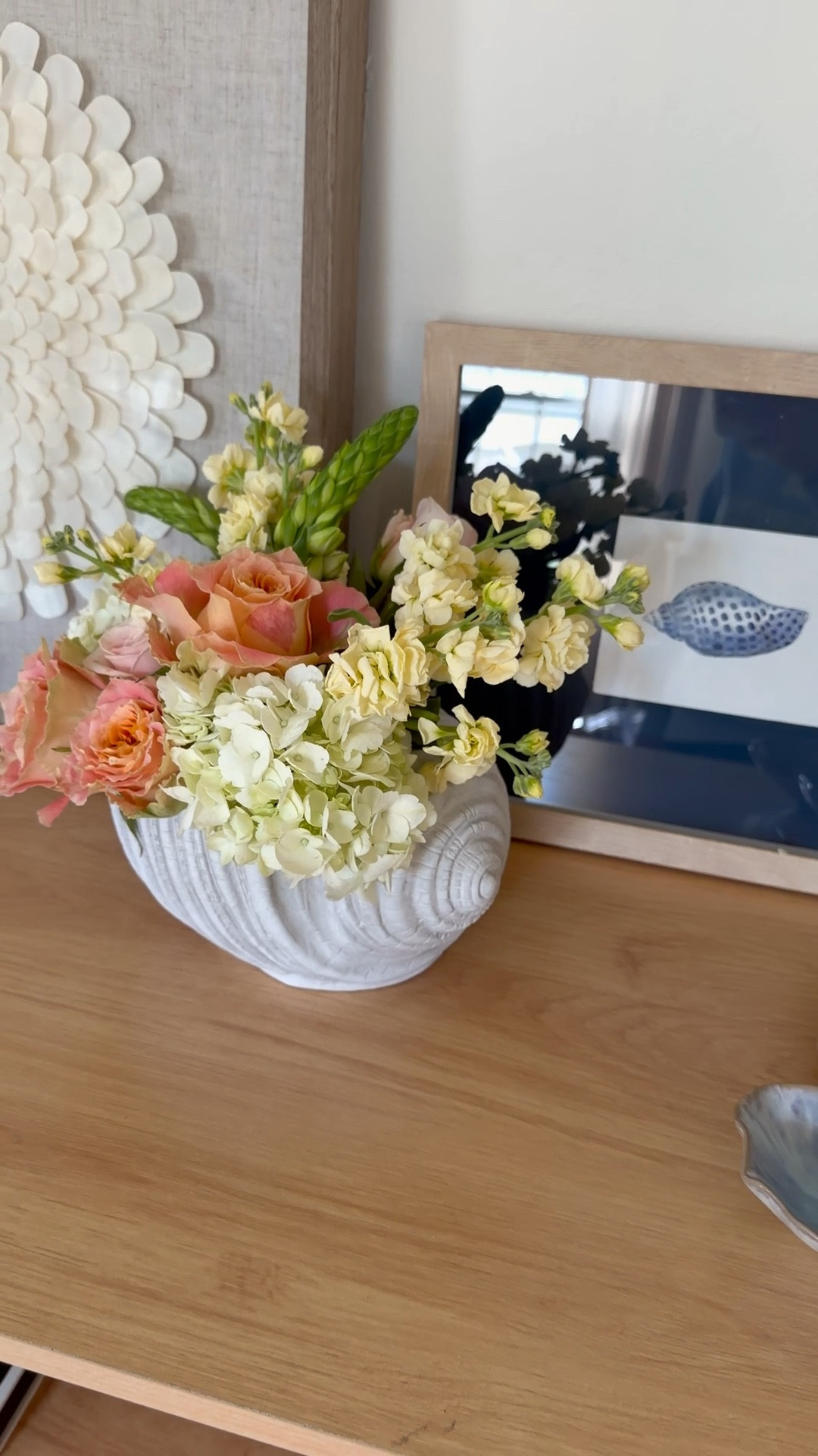 I loved this shell planter at first sight, it’s giving pottery barn and I knew I wanted to fill it with flowers. Trader Joe’s are my fave and I used a combo of hydrangea, garden roses, spray roses, stock and star of Bethlehem. 

#LTKSeasonal #LTKHome