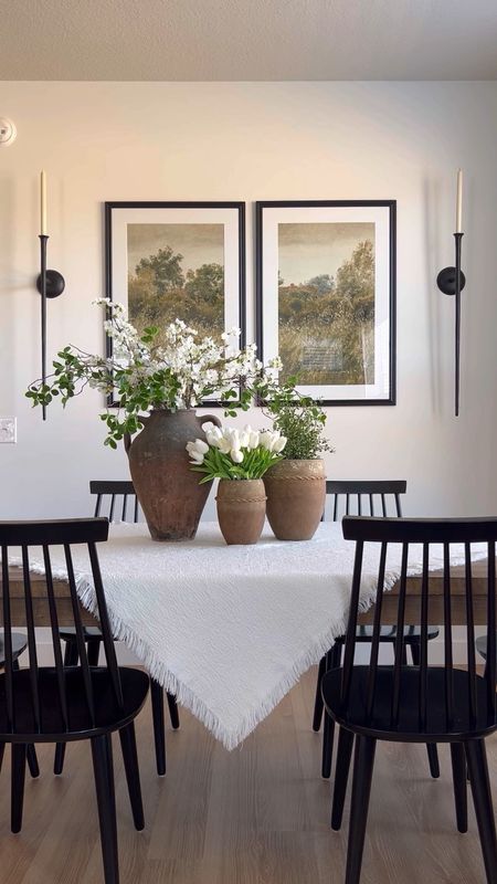 I love using pottery vases on my dining room table. They make a statement filled with seasonal florals or greenery. 

#ltkvideo

#LTKhome #LTKSeasonal #LTKstyletip