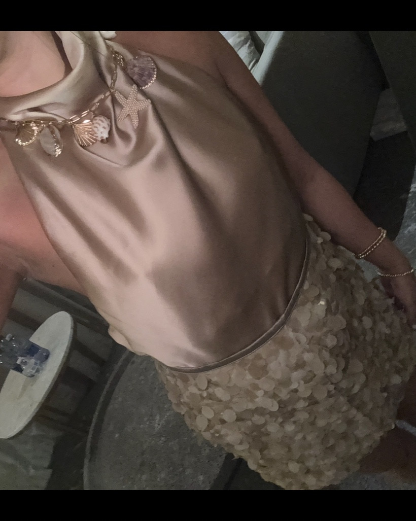 Golden hour glam in this Zara set ✨
Wore this silky halter top + sequin paillette skirt combo for a beachy night out, and it might be one of my fave looks ever. Necklace is a Target find (and so cute with the shells + starfish 🐚).
Chic, neutral, and perfect for tropical vibes 🌴

Zara top: 2069/399
Zara skirt: 3920/221

#LTKTravel #LTKFindsUnder100