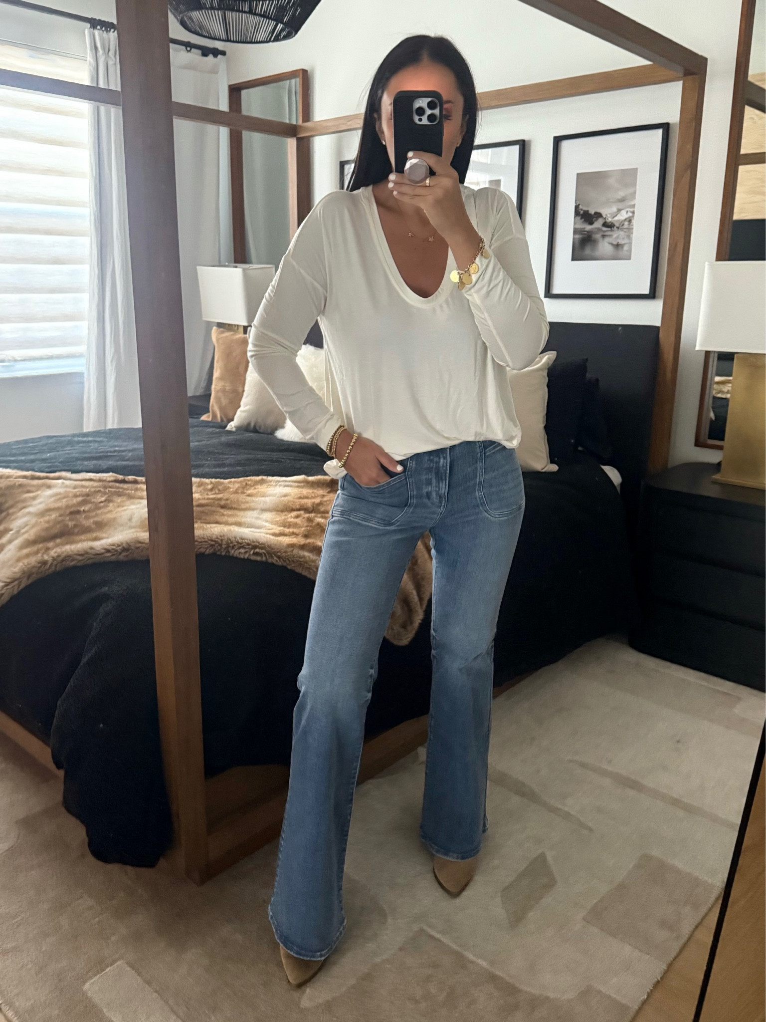 Mid Rise Medium Wash FlexX '70s Flare Jeans. Supersoft Relaxed V-Neck Long Sleeve Tee
