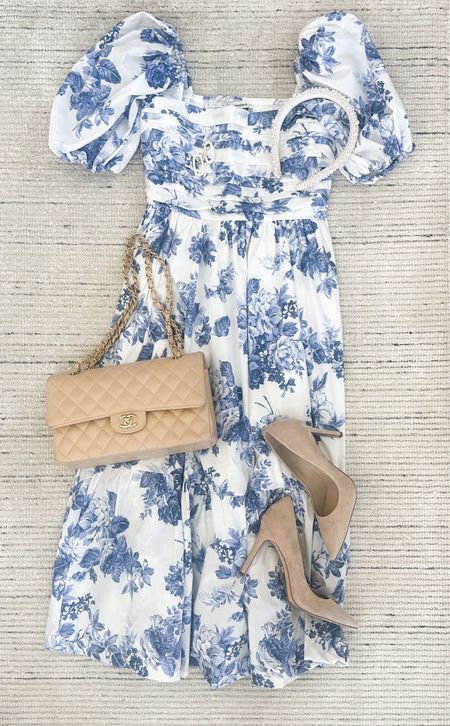 Blue floral midi dress that has puff sleeves a cinched waist and tiered skirt. Perfect for workwear, spring outfits, date night, maternity, or vacation outfit. Super flattering on and very comfy! Can be dressed down with sneakers, too. Also includes pocket which I love 

#LTKworkwear #LTKstyletip #LTKSeasonal