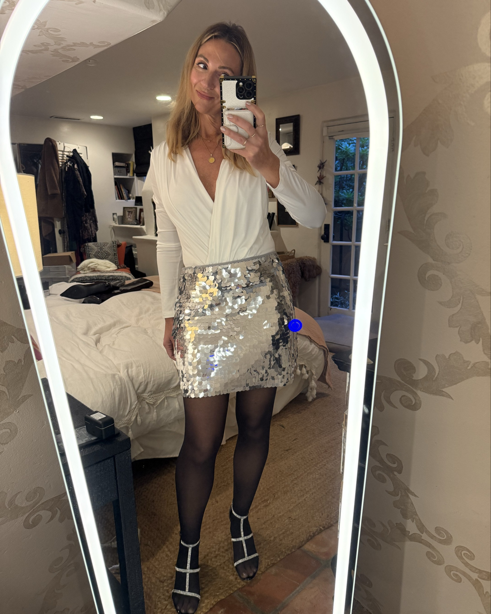 New Year’s Eve outfit ✨
Classic, chic, and ready in time for the party. A long-sleeve white bodysuit paired with a sequin mini skirt, black tights, and rhinestone T-strap stilettos. Even better? Everything is Amazon Prime with fast shipping, so you can get this look delivered before NYE. 🥂
Linked here for easy last-minute New Year’s Eve outfit shopping.

#LTKHoliday #LTKootd #LTKFindsUnder50