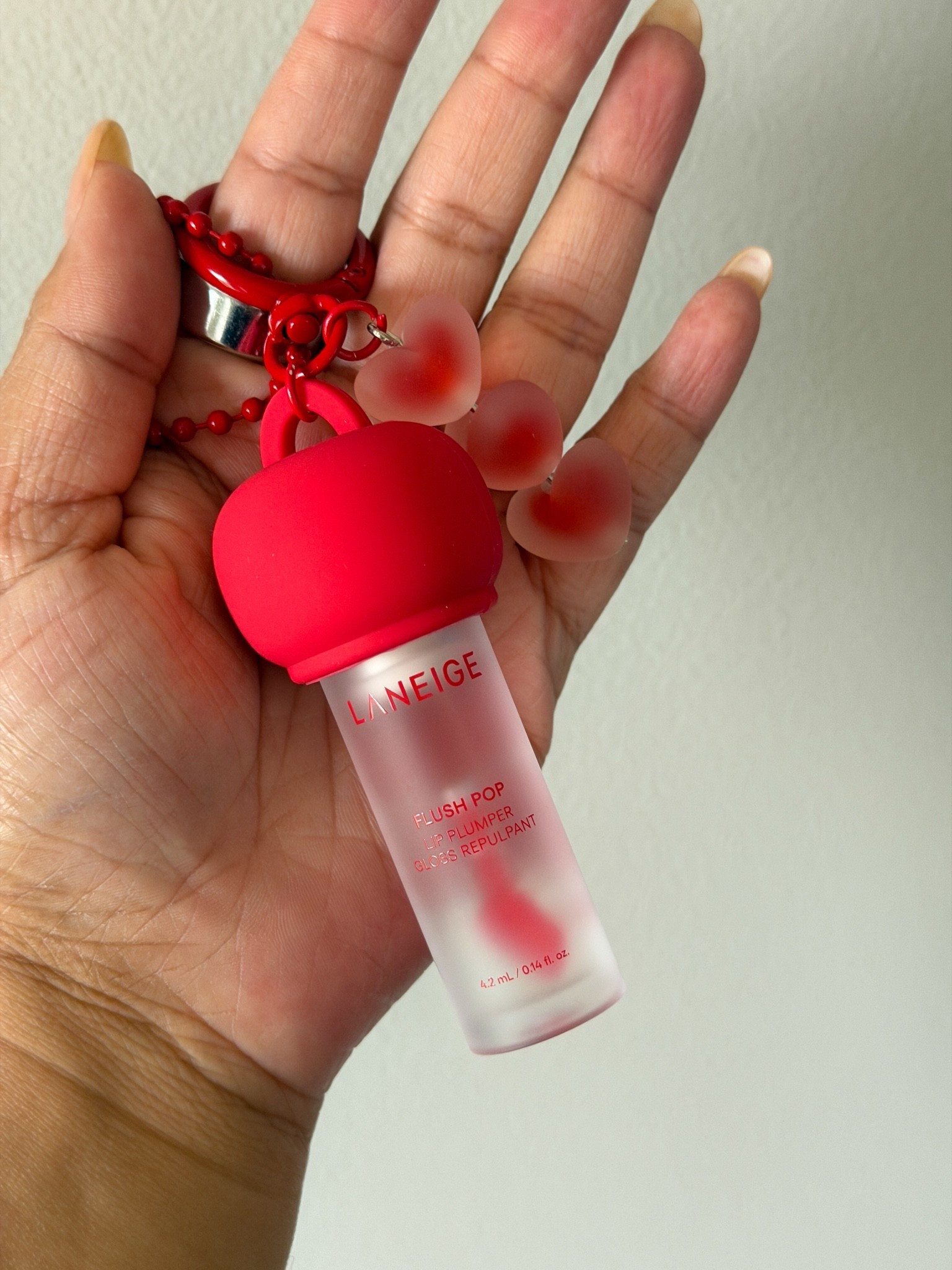 A little close-up of the new Laneige Flush Pop Lip Plumper. I’ve been looking for a comfortable daily plumper that doesn’t feel too intense or sticky, and this formula really caught my eye. Love how the heart keychain charm looks with it, too.

#LTKgrwm #LTKBeauty