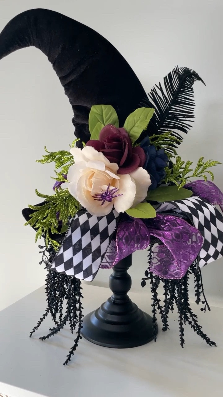 This is one of the prettiest Halloween decorations I have found in years!!! It is stunning in person and so large. It feels very substantial. The best part is…it’s on major sale right now!! It is half off! Even if the colors on the bows are not your style, they can easily be covered with different ribbon. 
.
.


#LTKSeasonal #LTKHolidaySale #LTKHalloween