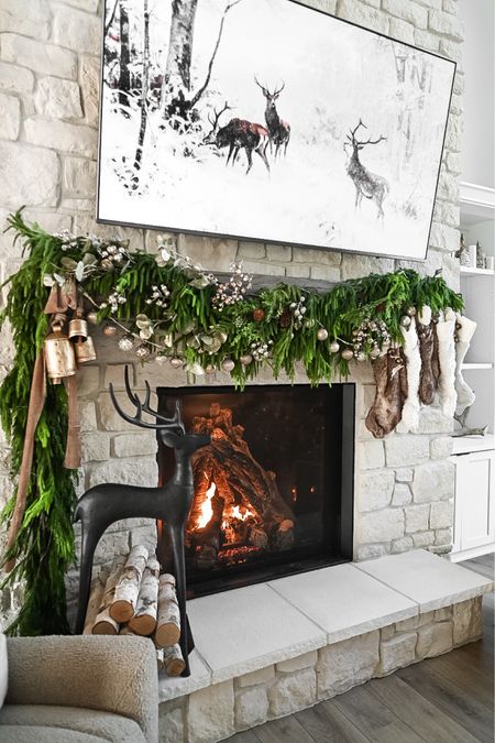 Holiday mantle inspiration. Grab the garland before it out of stock! 

Mantle decor. Holiday home decor. Fireplace decor. Mantle styling  

#LTKSeasonal #LTKHoliday #LTKhome