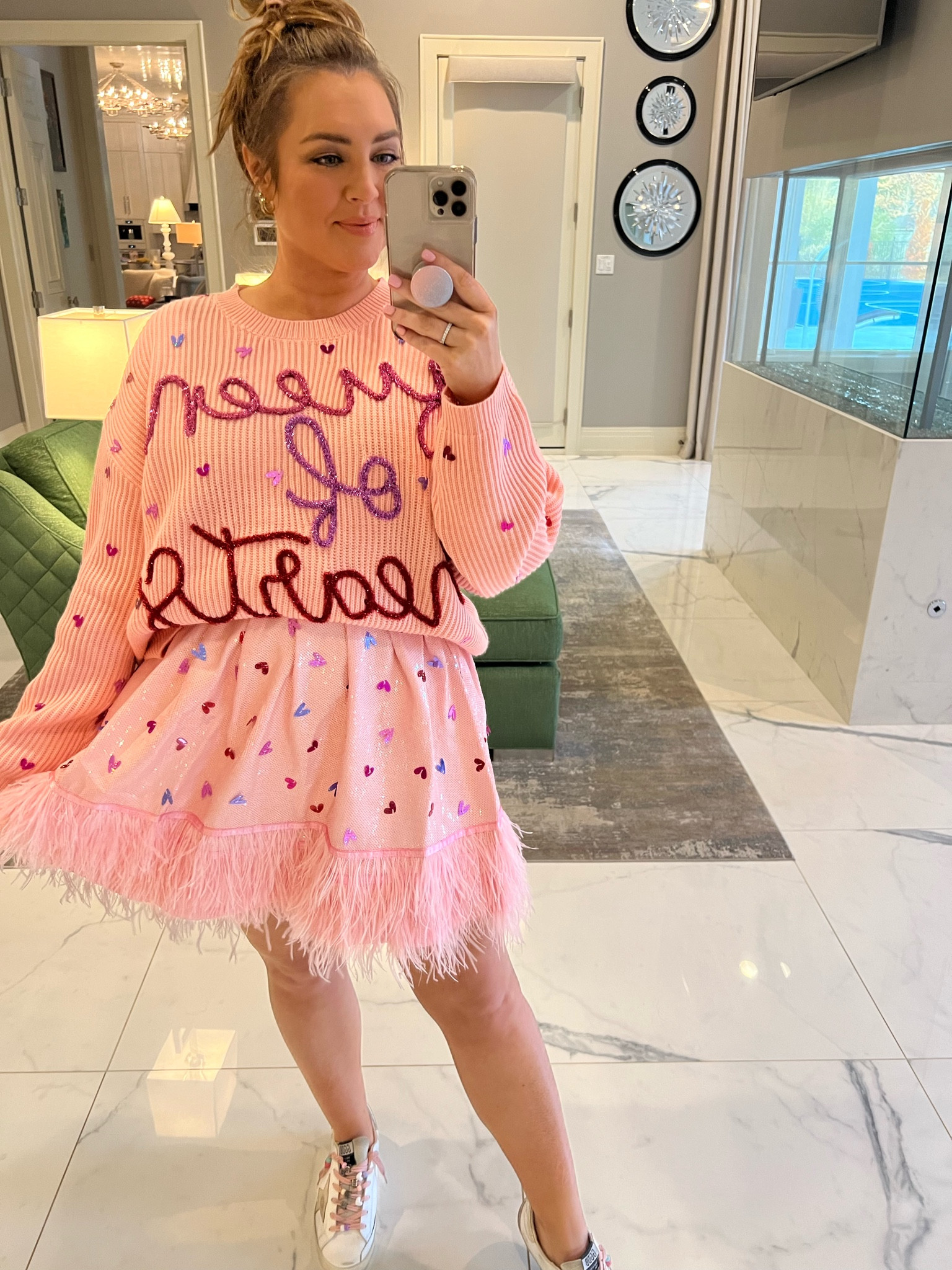 Queen of sparkles, queen of hearts, pink sweater, and pink, sequin, and feather skort. Valentines!

#LTKSeasonal