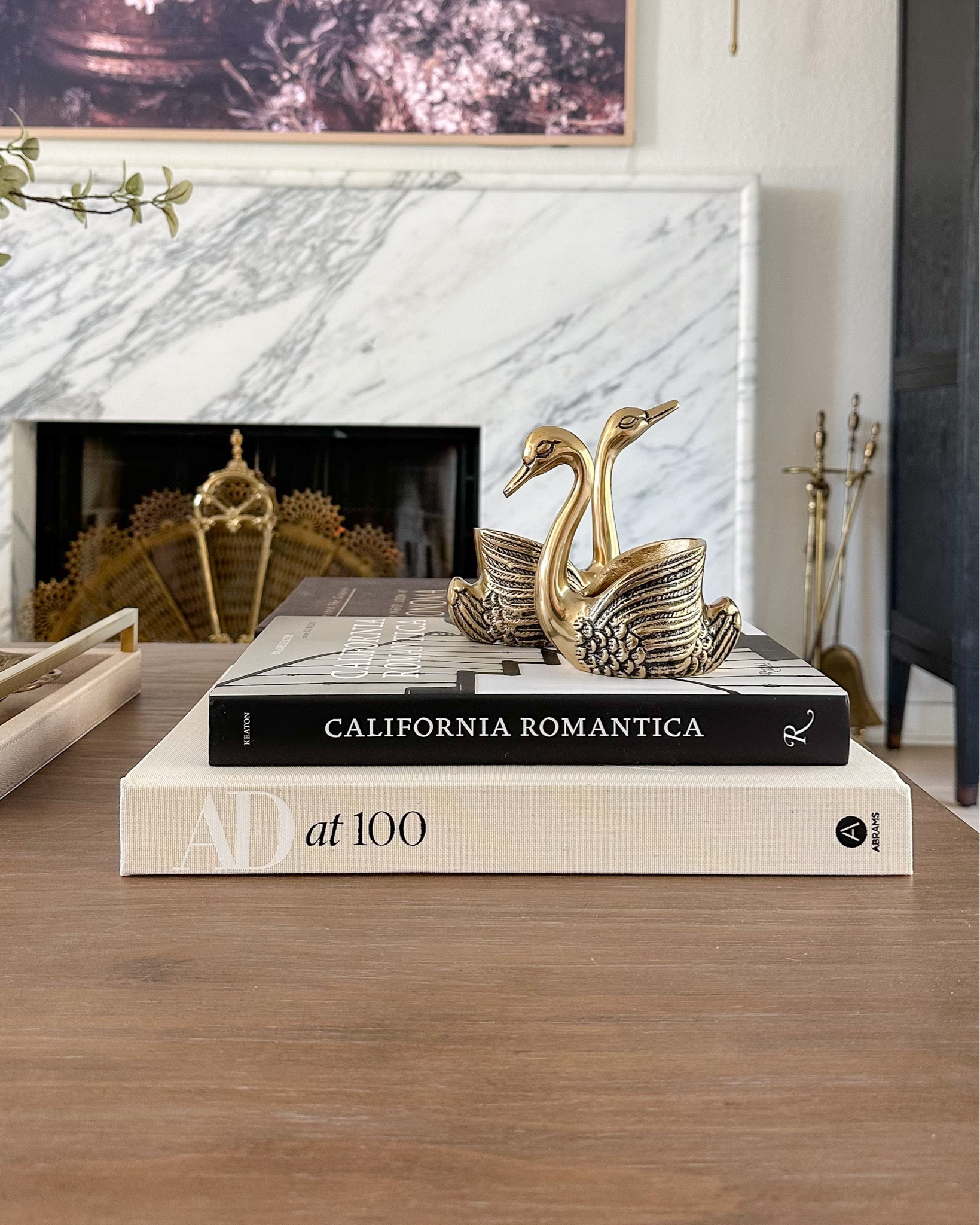 Coffee table styling details including these vintage inspired brass swans I found on Amazon!

#LTKfindsunder50 #LTKhome #LTKstyletip