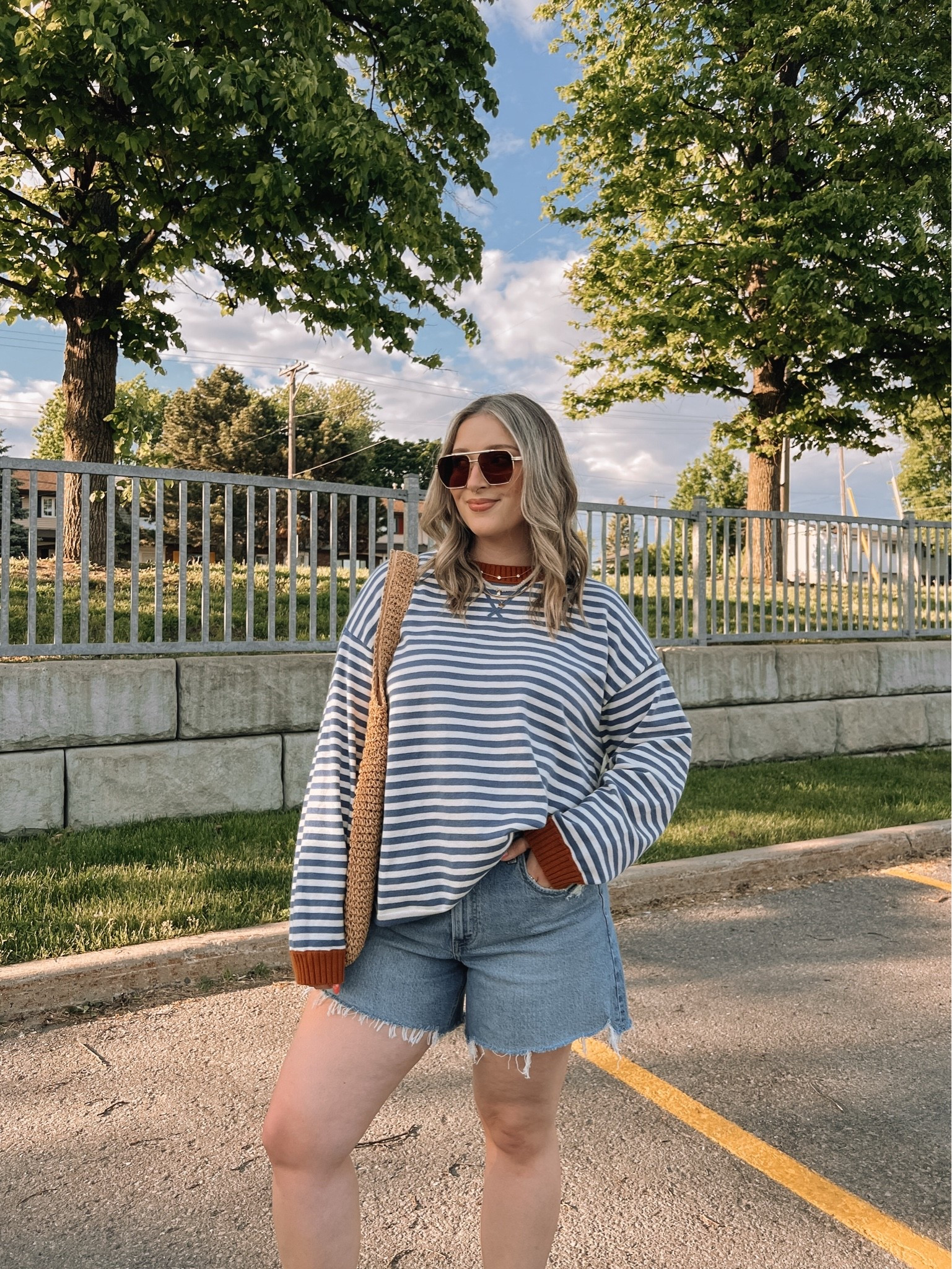 Comfy early summer outfit! Sized up to 32 in the denim shorts for a looser fit. Sweater is sold out from aerie, but linked the newer version of it (same stripe & fabric, just without cuffs). Crocs sandals are super comfy, I’m a 9.5-10 and wear a 10. Canadian Crocs link under “similar products”

#LTKsummer #LTKsale #LTKmidsize