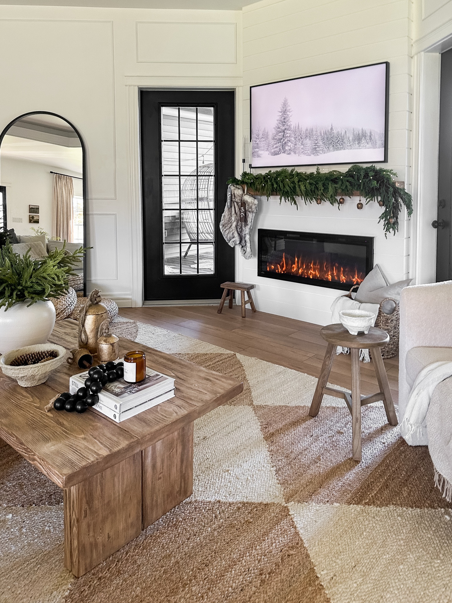 let the Christmas decorating begin! 

this year's simple holiday mantel! 🎄

up next... the Christmas tree! this year I’m doing an artificial tree, but I don't know... there's just something about a real tree and the whole experience of picking it out that I love! A are you team real tree or faux tree?

styling details: 

* layered three garlands to get a fuller look, but honestly one or two would still work great! 👌🏽
* added a strand of fairy lights and a few bells for that extra festive touch 
* I used command hooks to hang everything without damaging my mantle! 
* hung the stockings and added these cute name tags to personalize them
* finished it off with two faux candles

#LTKsalealert #LTKhome #LTKHoliday