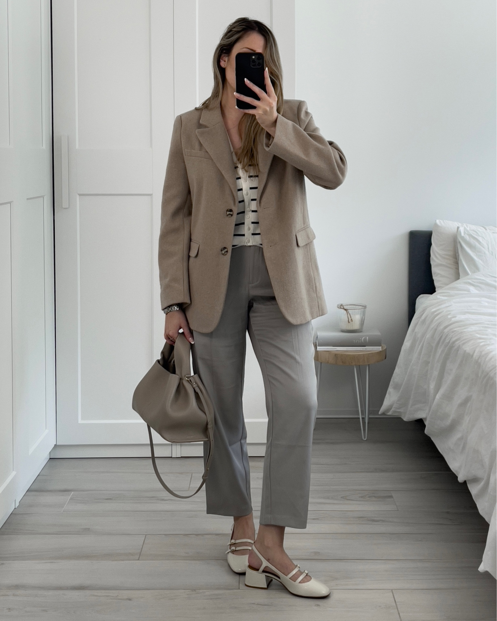 Spring city chic outfit ✨

* paula babies shoes from Sézane | I’m wearing my regular size (39 EU) & they fit perfectly 🙌🏼
* grey tapered trousers from NA-KD, linked similar
* wool blazer from (old) NA-KD, linked similar
* striped vest/top from (old) Zara, linked similar
* nb9 bag from Polène 

#LTKshoecrush #LTKSeasonal #LTKworkwear