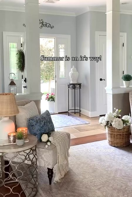 Summer entryway styling! Shop area rugs, throw pillows, throw blankets, florals, baskets, side chair, lamp candles. Summer home decor accessories. 

#LTKSaleAlert #LTKVideo #LTKHome