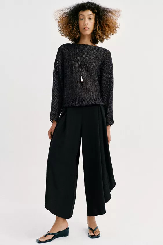 High-waisted pants with front pleats and elastic back waistband. Wide leg with vents. | Zara US