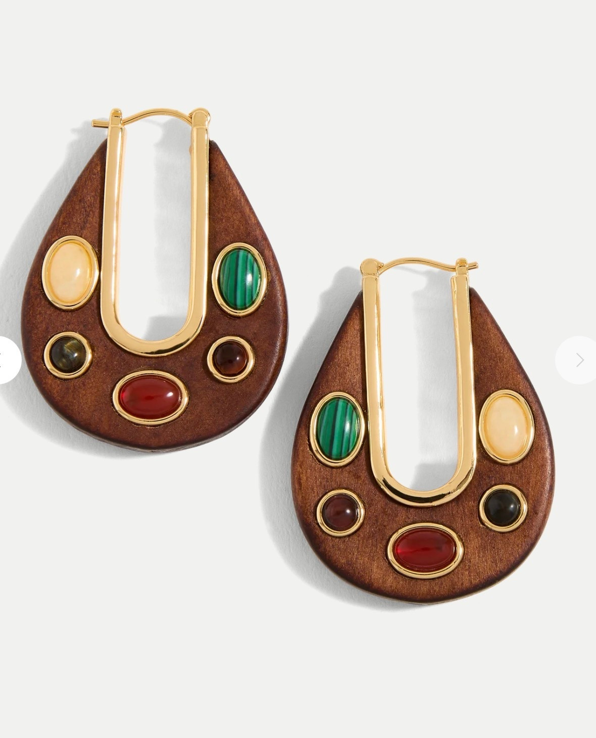 Wood Embellished Drop Hoop

Our signature drop hoop—reimagined in wood with a boho twist. Featuring bezel-set cabochon stone details, it’s finished with a 12k gold-plated brass inner rim and a click-top closure for easy wear. Style it back to casual outfits and night-out looks alike

#LTKTravel #LTKootd #LTKWorkwear