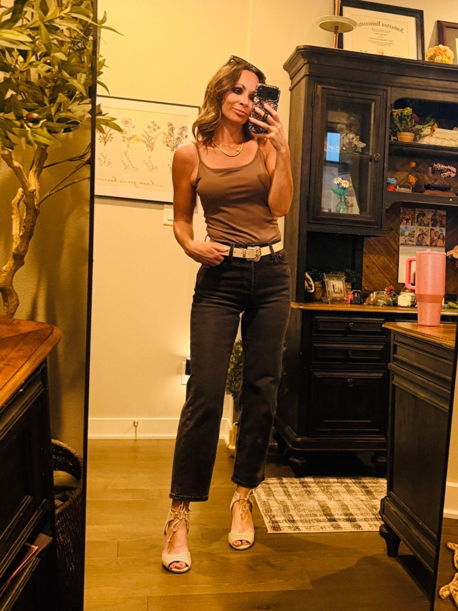 Easy going out outfit. I love these Levi’s on Amazon with a neutral super soft cami that has a built in bra. Lace up nude heels and minimal jewelry and it’s complete.

#LTKOver40 #LTKSeasonal #LTKootd