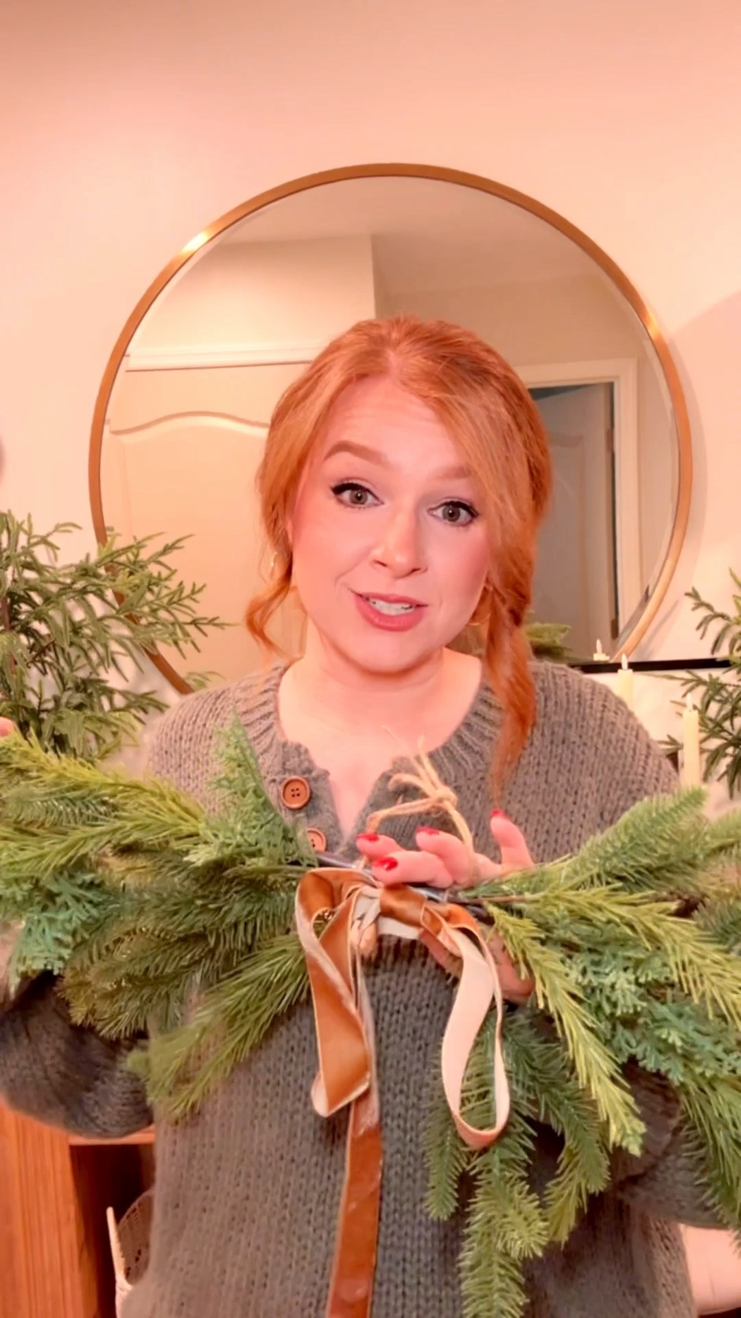 Hanging a Christmas swag on my round mirror 

#LTKHome #LTKSeasonal #LTKHoliday