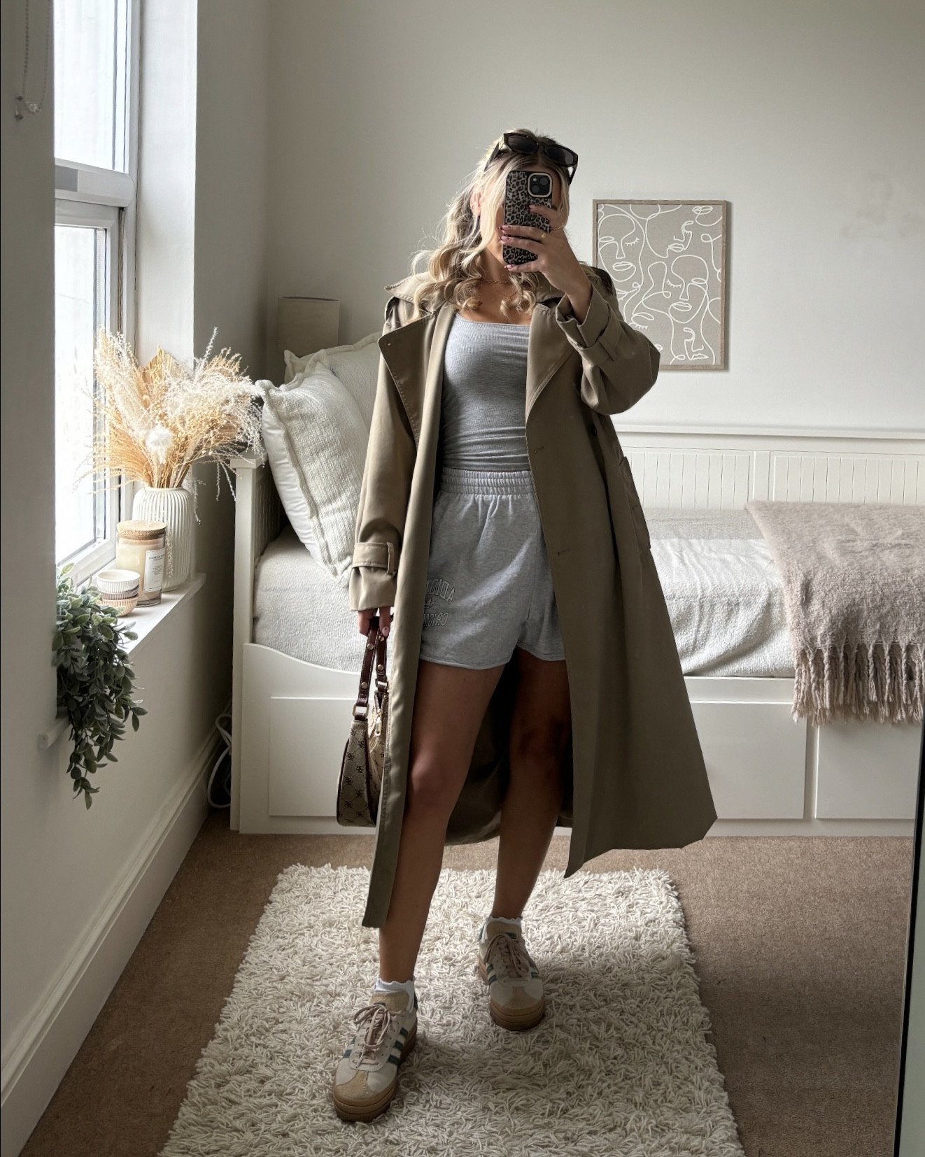 the ideal outfit for humid, rainy weather 🌦️ 

comfy, casual & cute 🩶
trench coat, sweat shorts, grey vest top, adidas bold trainers 🩶

#LTKuk #FashionMonth #LTKautumn
