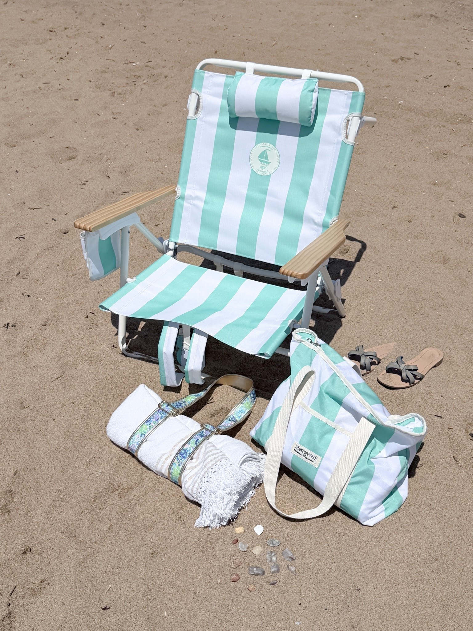 Loving this new beach chair for summer. Not only does it have five reclining positions including lay flat, it has a built in cooler in the back, backpack straps for easy transport & you can get coordinating coolers and tote bags which are the perfect size for a day trip