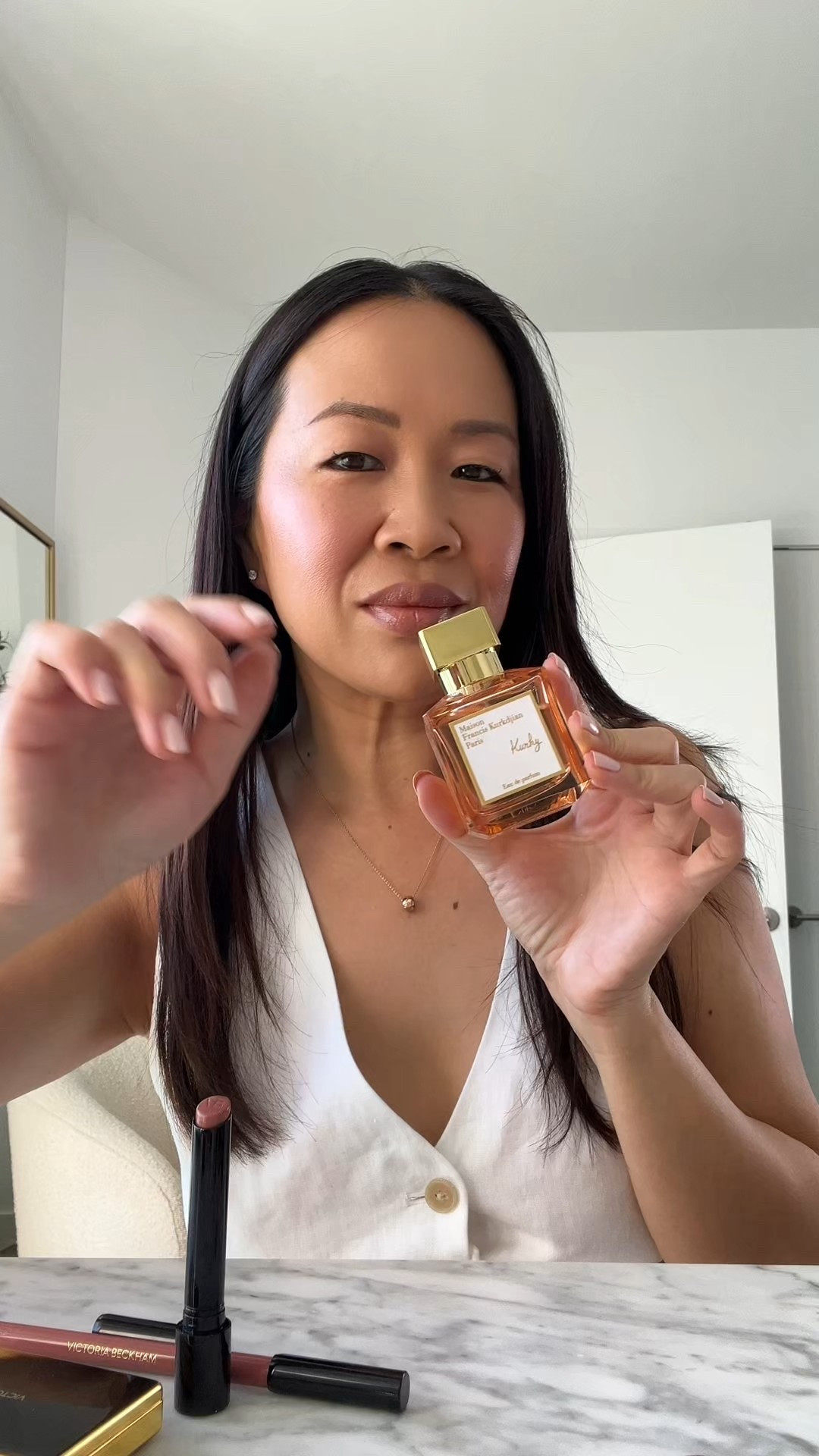 One of my favorite fruity gourmand perfume scents this year! Maison Francis Kurkdjian Kurky. Sweet and creamy!  

Top Notes: Juicy raspberry and peach.
Heart Notes: A fruity accord with gummy candies and sweet treats.
Base Notes: Soft vanilla and white musks. 

Top: Aritzia
Lip combo: Lipstick in Twist + Lip Liner 02.5

#LTKBeauty