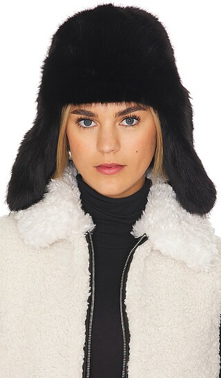 Trapper Faux Fur Hat in Black | Revolve Clothing (Global)