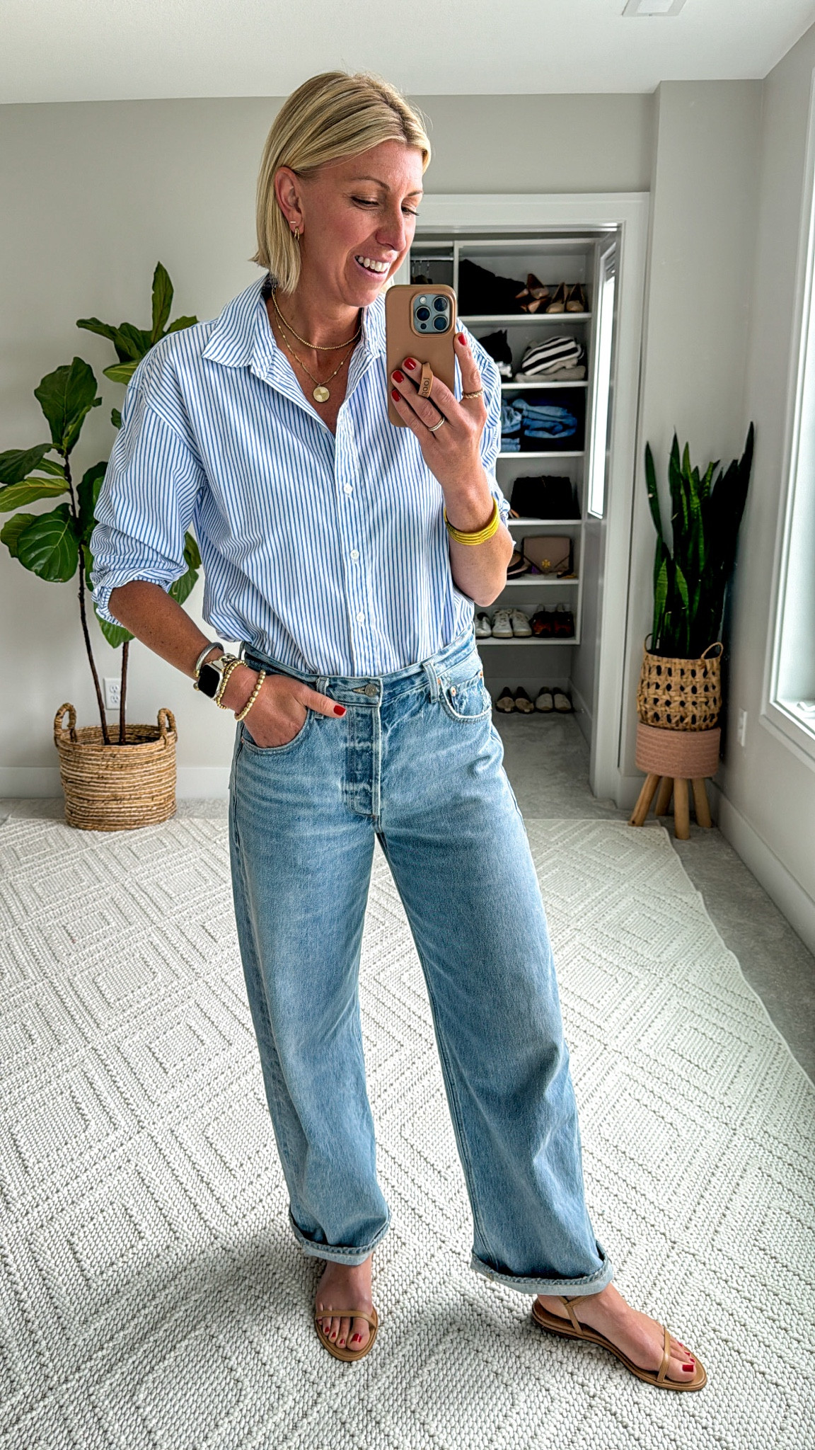 What I’m wearing today: jeans for summer!
wide leg jeans, a stripe button up shirt, nude sandals 

#LTKOver40 #LTKWorkwear #LTKStyleTip