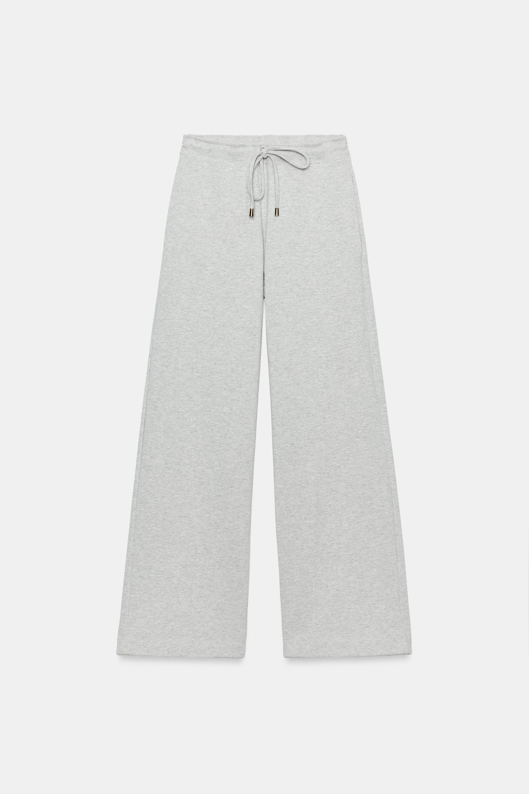 Trousers made from a cotton blend. Mid-waist design with an adjustable drawstring waistband. Feat... | Zara US