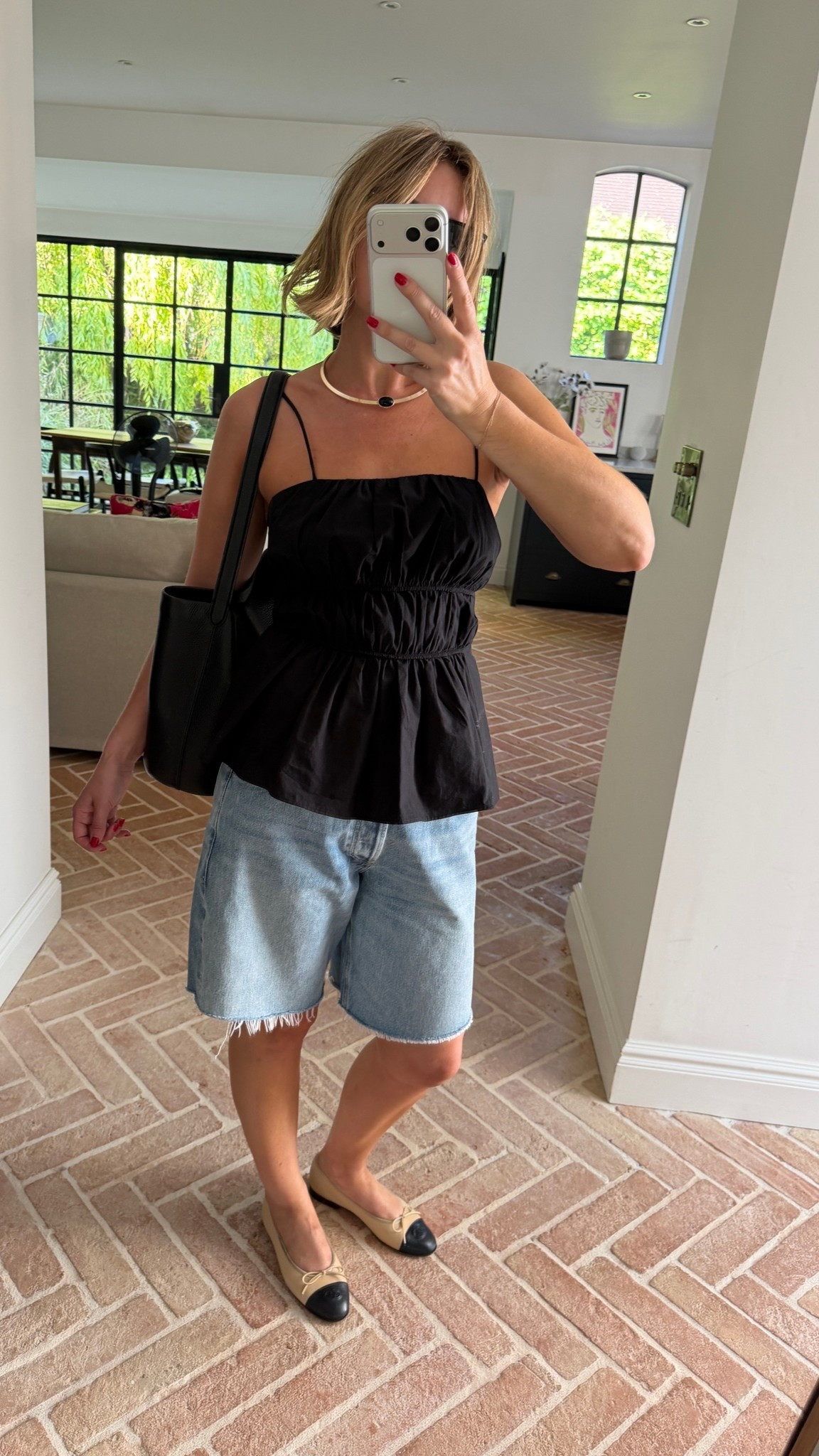 It’s summer in the city | heatwave outfit | black cotton poplin top | baggy shorts | denim shorts | long shorts outfit | Chanel pumps outfit ideas

#LTKeurope #LTKuk #LTKsummer