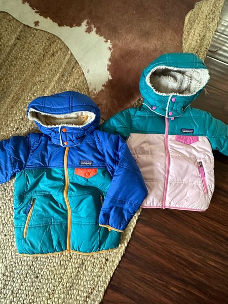 The kid’s winter coats just came in the mail! Patagonia reversible Tribbles hooded jackets in Peaceful Pink and Belay Blue

#LTKkids #LTKGiftGuide #LTKbaby
