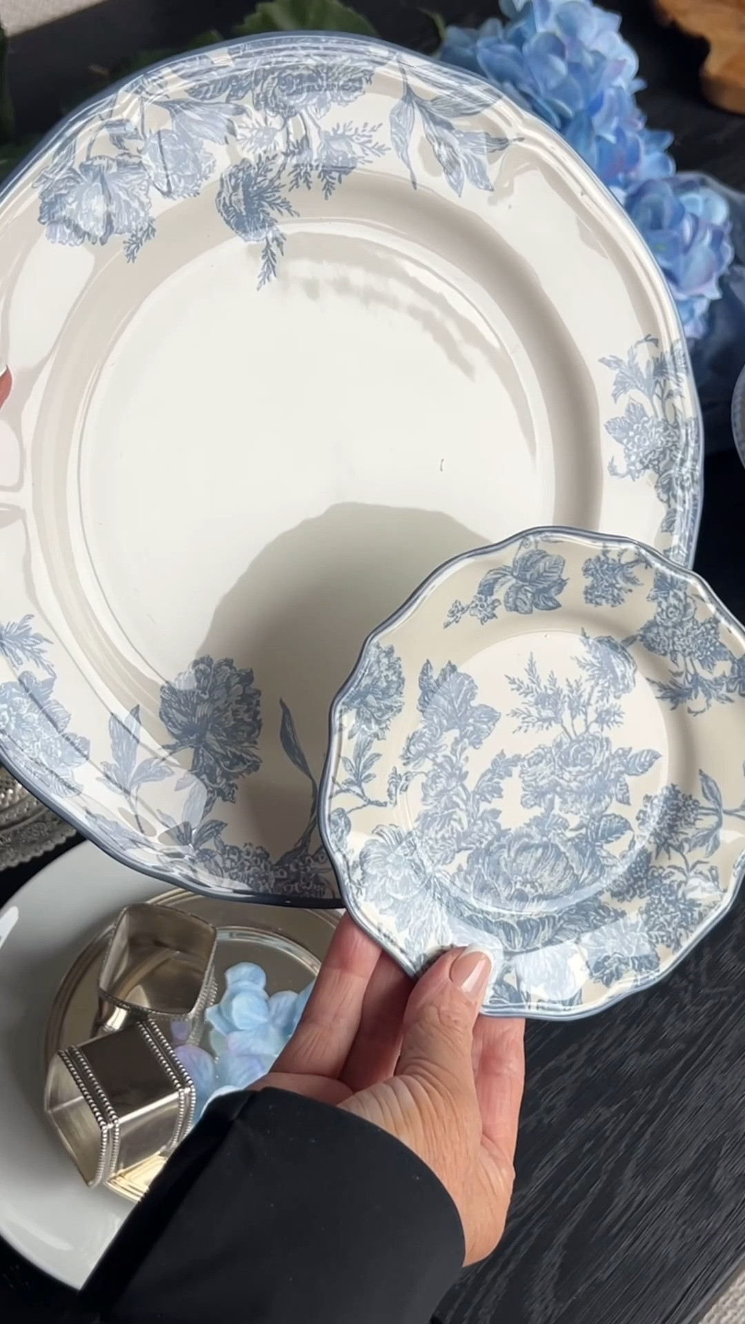 Elevated hosting pieces that look high-end but are budget-friendly, including black matte dishware, blue toile dinnerware, glass tea light lamps, ribbed glass cylinders, white hemstitch napkins, and a modern hammered glass chandelier for spring tablescapes, Mother’s Day brunch, and everyday entertaining.

#LTKHome #LTKSeasonal