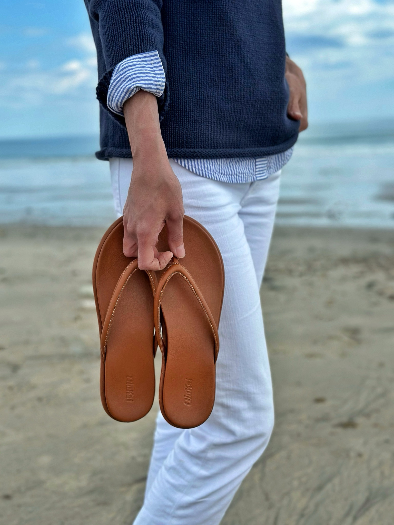 It’s still cool around here but you know as a die hard beach gal, I couldn’t let an almost 70 degree day pass without heading to the sea, even if it is still April. You’ll be seeing my new @olukai sandals in heavy rotation all season. They are a classic look for day to day made of a super premium full-grain leather. They’re super comfy & didn’t require any breaking in 😎 

#LTKstyletip #LTKSeasonal #LTKshoecrush