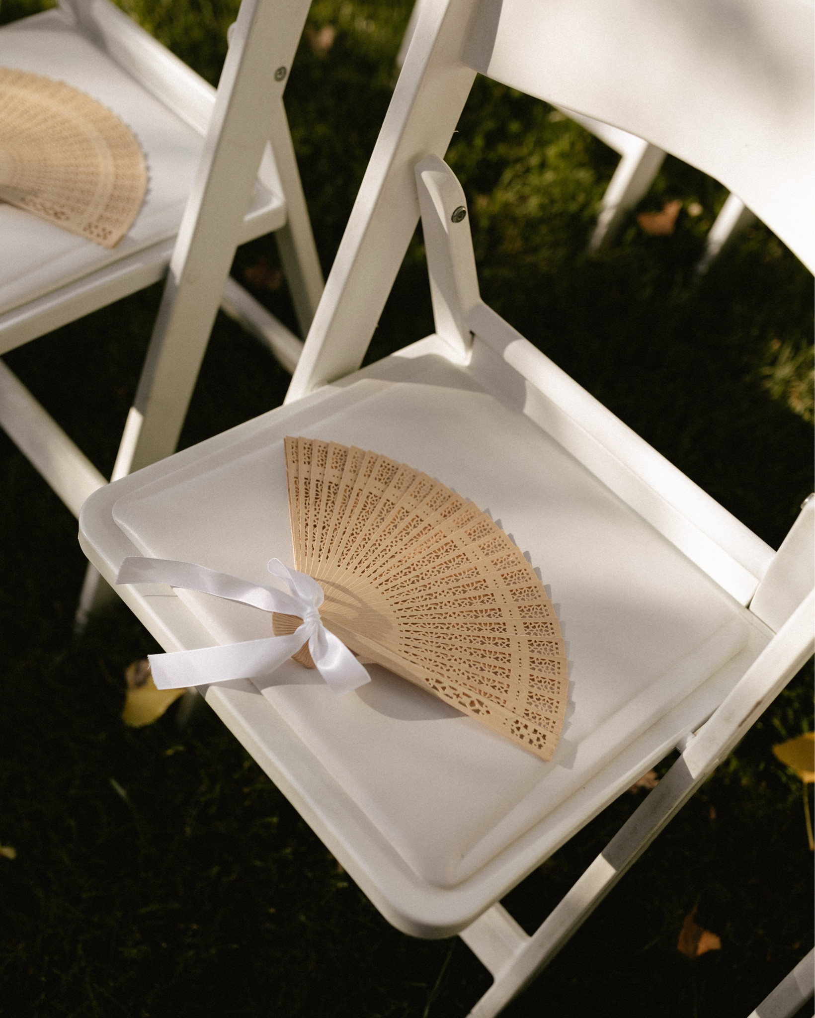 DIY fans for the ceremony chairs and heel stoppers for the ladies. Photography by @graciewilsonphotography 



#LTKWedding #LTKWedding