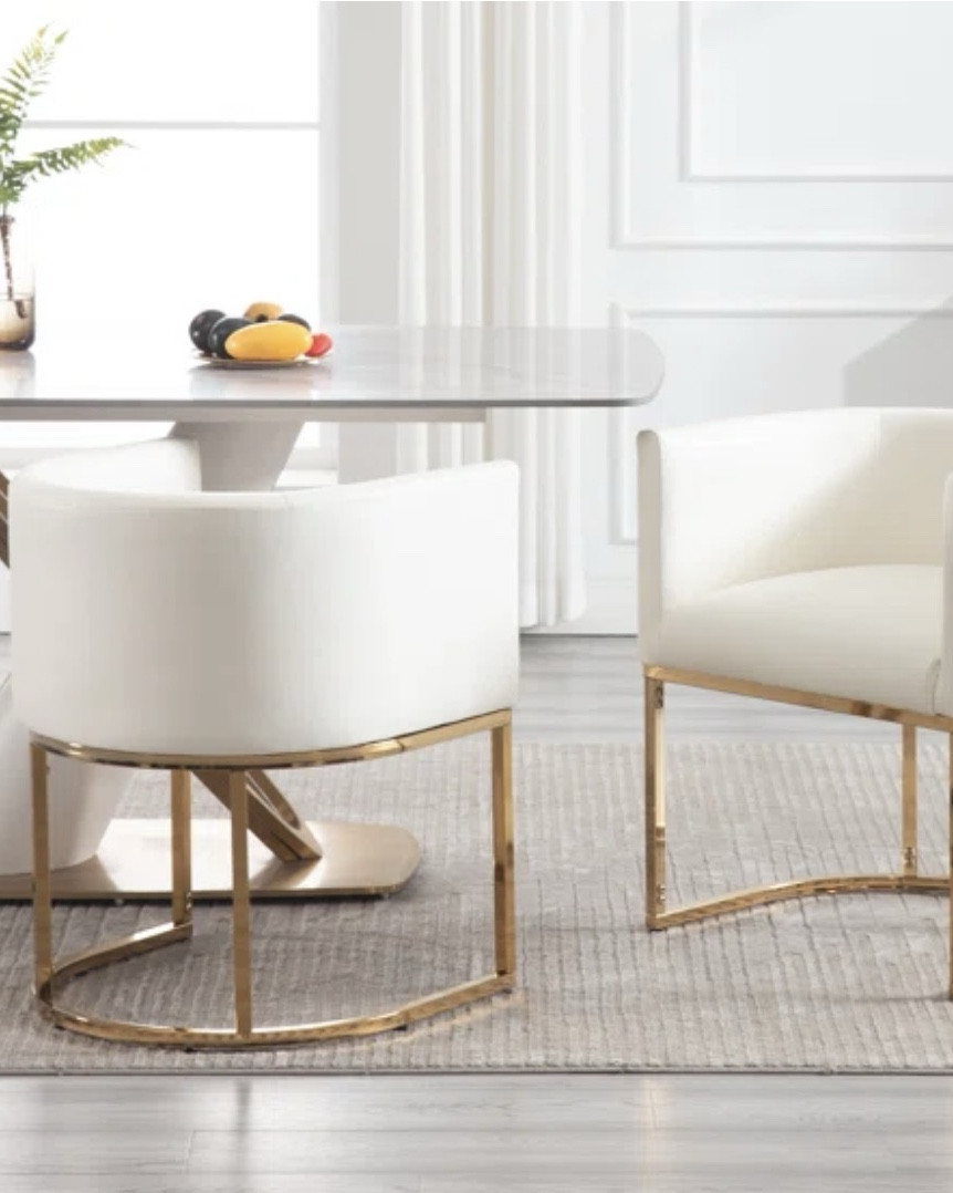 Upholstered faux leather dining chairs

These dining chairs feature a modern barrel design. Great price sold by Wayfair  

#LTKFamily #LTKHome #LTKU