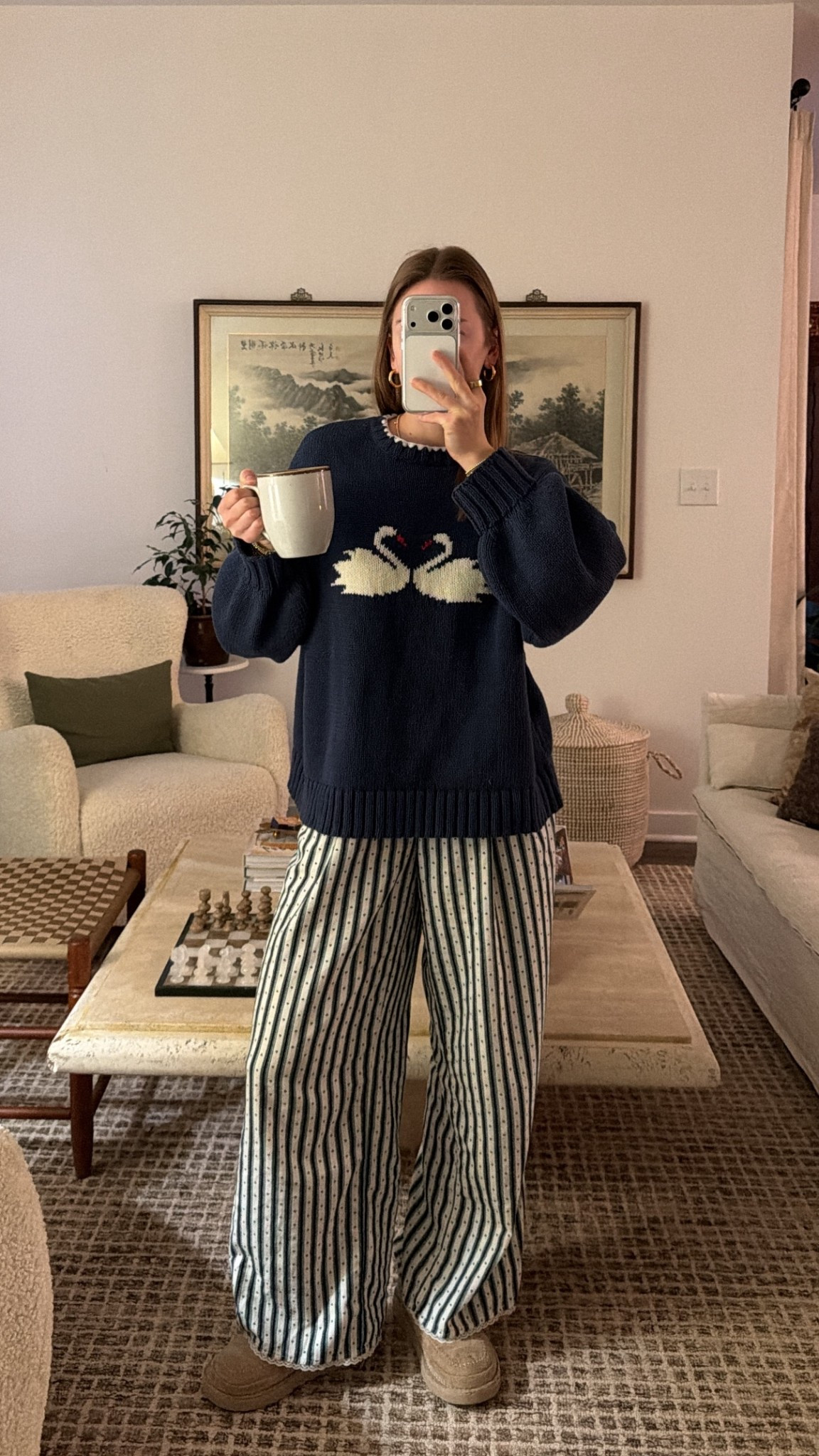 2/4/26 Cozy morning loungewear lately 🤍 Wearing my striped pajama pants from Aerie and my navy swan sweater from Princess Polly. The sweater is a size M/L for an oversized, comfy fit — perfect for slow mornings at home.

#LTKootd #LTKmorningroutine