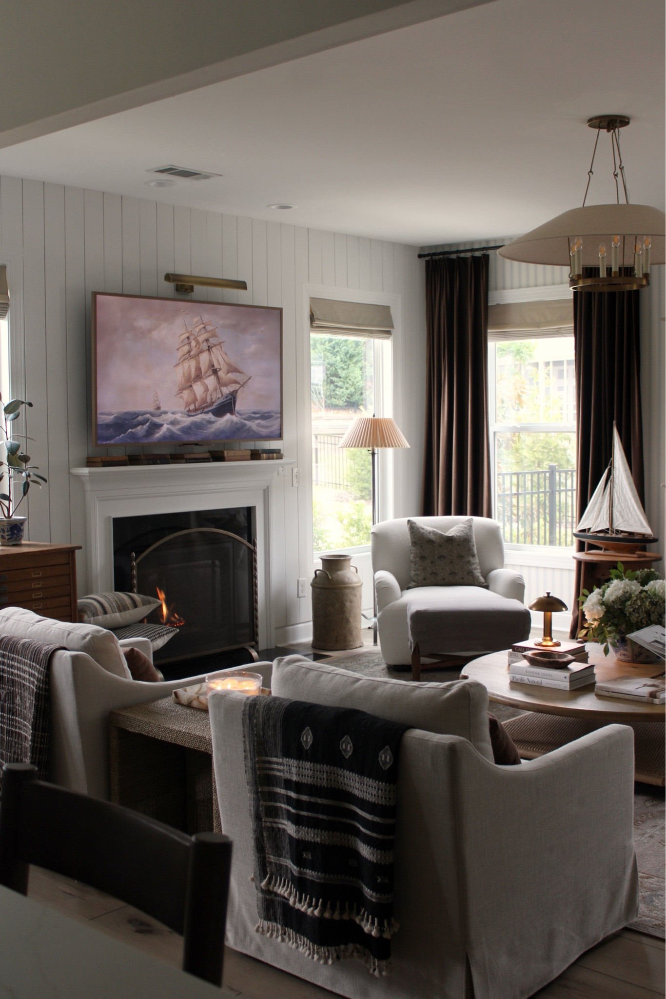 Living room, frame tv, white swivel chairs, affordable living room finds 

#LTKHome