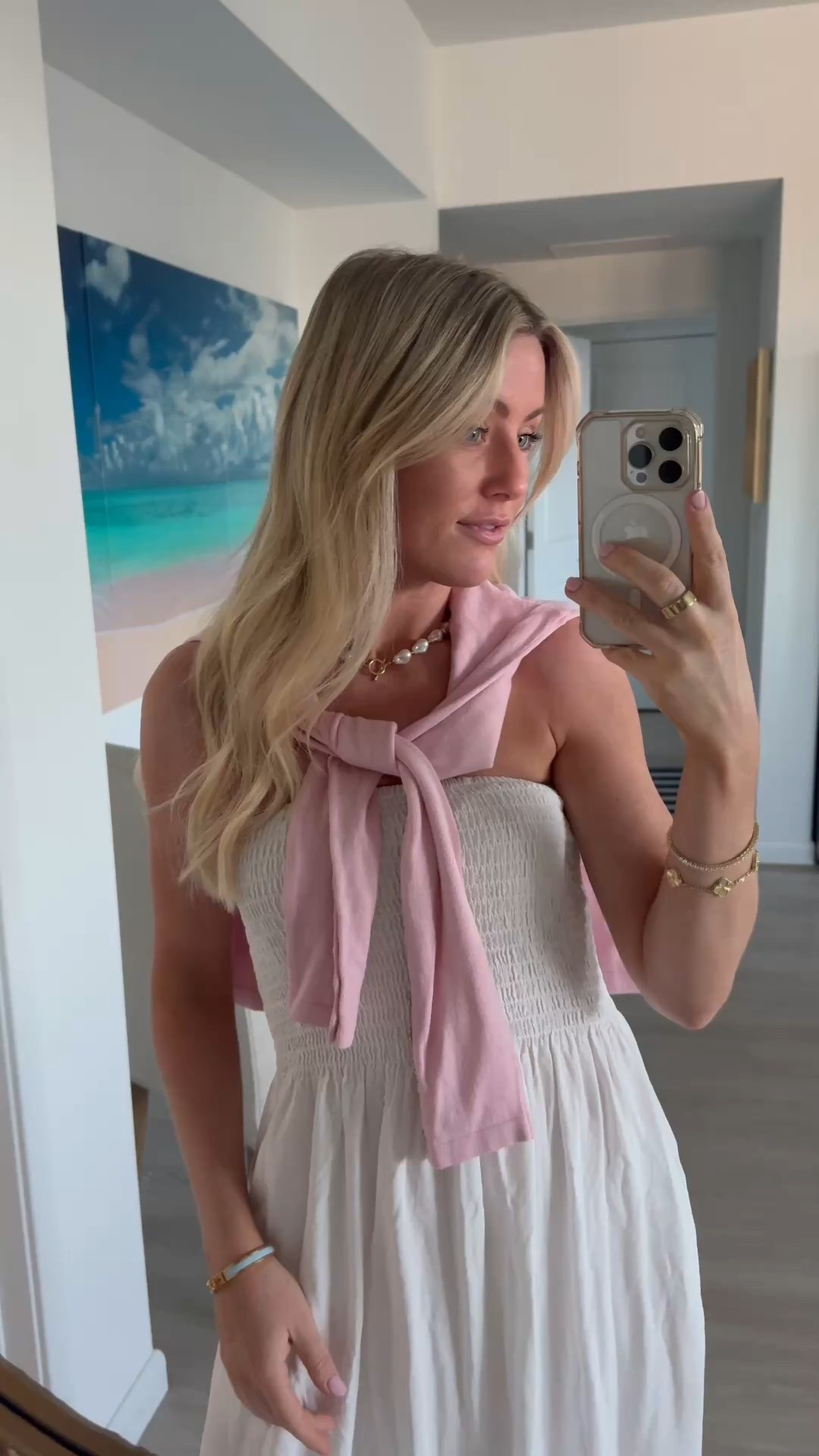 Pink & White for spring 🌷💕 LOVE a cozy smocked dress paired with a sweater for an easy dinner outfit