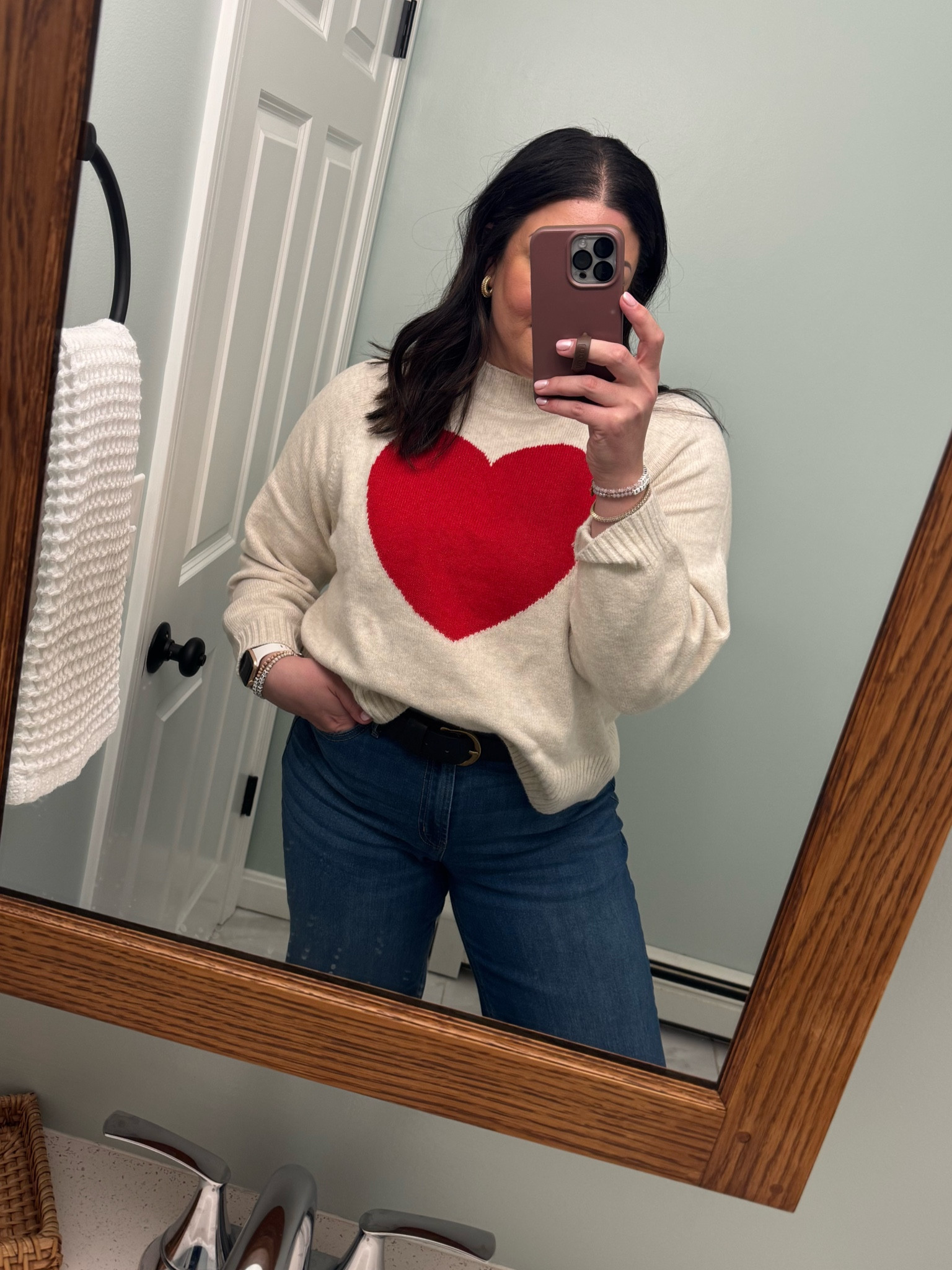 This sweater is SO SOFT and adorable for Valentine’s Day! Wearing a L in the sweater and a size 14 in jeans 💖 

#LTKSeasonal #LTKFindsUnder50 #LTKMidsize