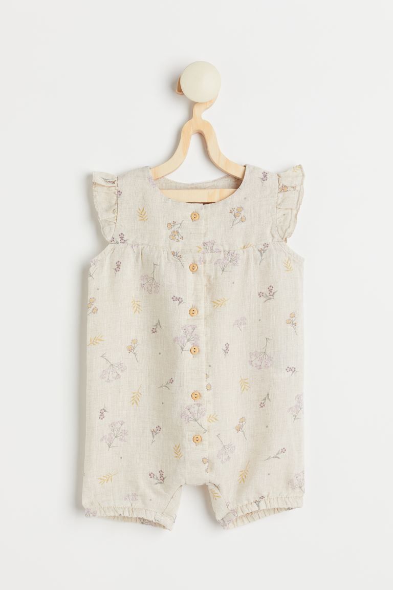 Baby Exclusive. Romper suit in linen with a printed pattern. Yoke, flutter sleeves, buttons at fr... | H&M (US + CA)