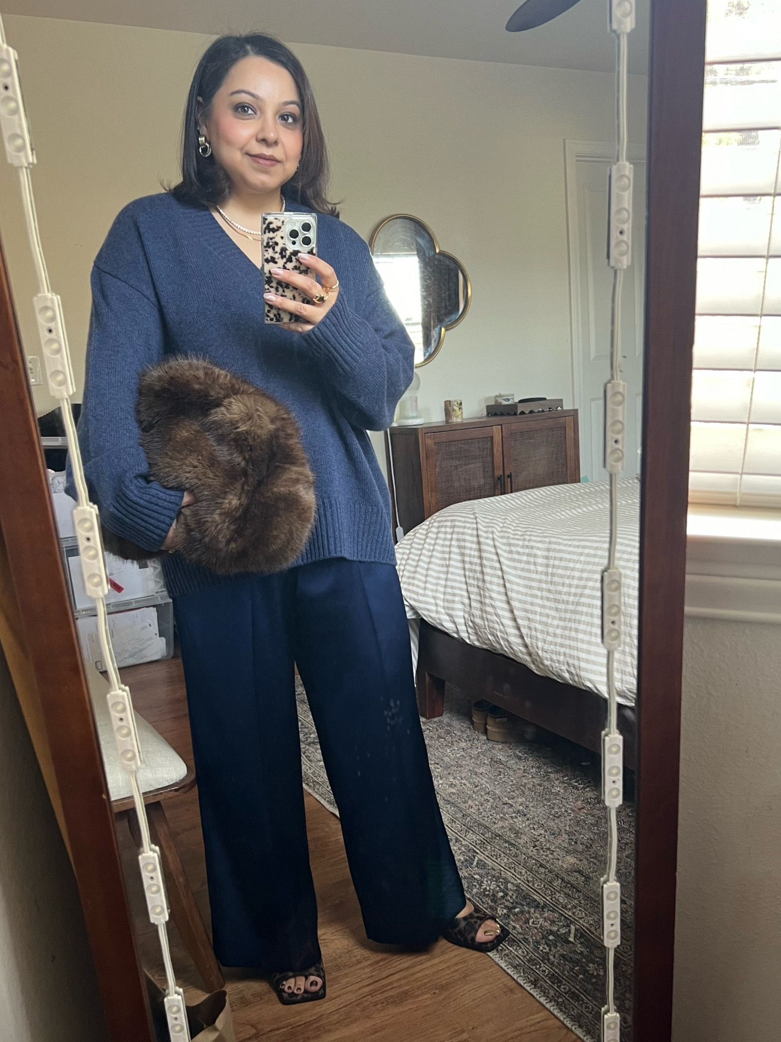 Comfortable glam outfit. Perfect for a lunch time event or even a laidback dinner with friends! 
-
Party outfit idea - reformation sweater - navy blue sweater - navy blue satin pants - target satin pants - square toe leopard mules Steve Madden - chunky silver cuff j crew - heaven mayhem earrings Amazon finds - Amazon jewelry- Mac lipstick warm teddy - neutral lipstick - brown eyeliner Victoria Beckham beauty - smoky brown eye - faux mink oversized clutch apparis bloomingdales - apparis clutch - faux fur clutch -
Navy and brown outfit - satin pants  outfitt

#LTKStyleTip #LTKMidsize #LTKItBag