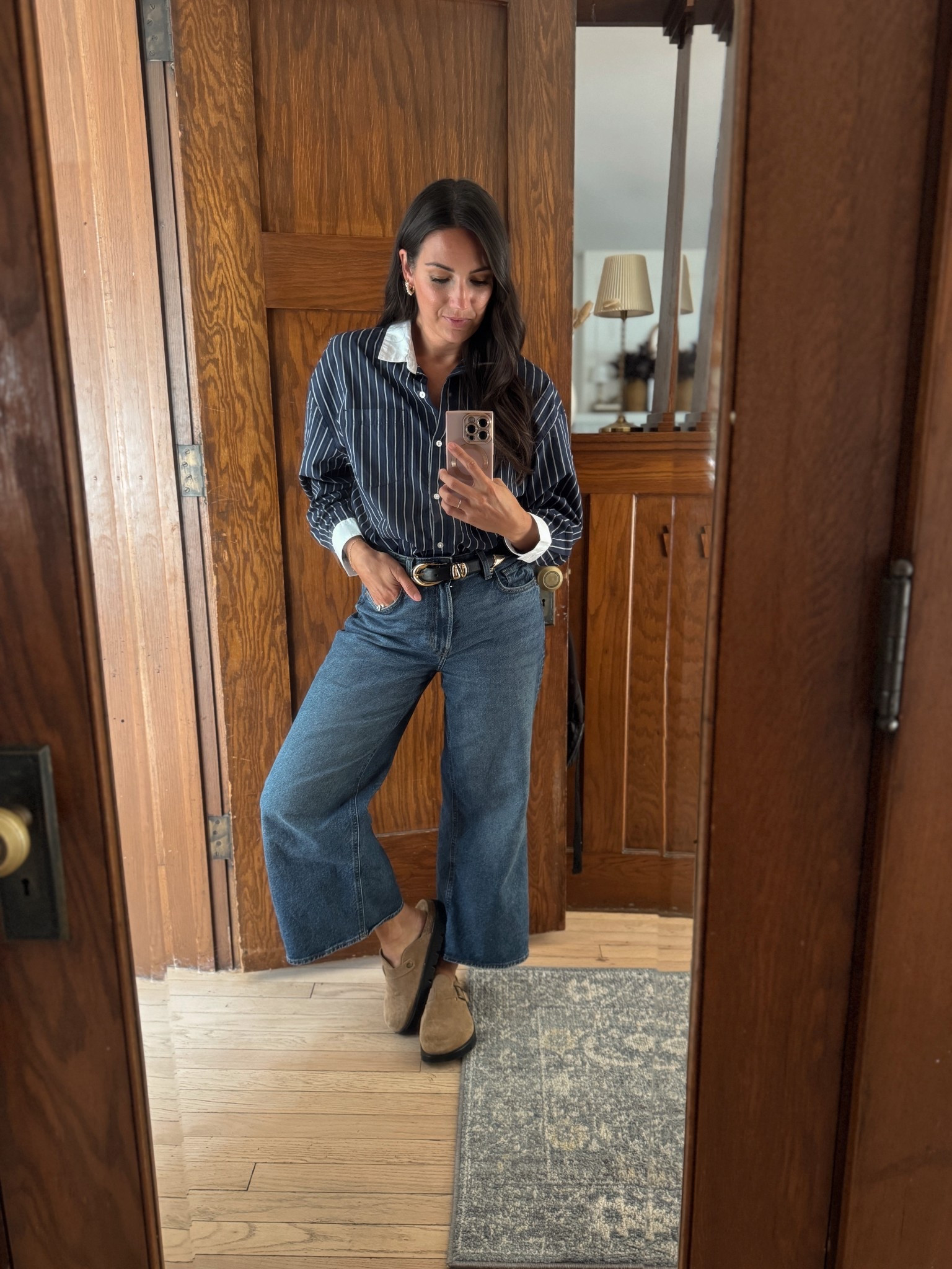 Classic with a twist ✨ A striped button-down (with the chicest contrast collar + cuffs) paired with wide-leg denim and my go-to suede clogs. It’s the kind of outfit that feels put together but still effortless for everyday. Linking all the details for you in my LTK so you can recreate this combo yourself! 🖤

#LTKStyleTip #LTKWorkwear #LTKFindsUnder100