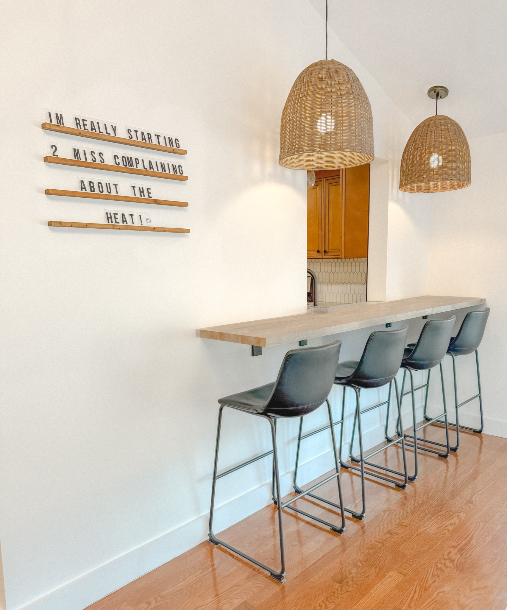 Rattan pendant lights , leather bar stool , bar height bar stool , butcher block , word board , wall decor , fun decor 
Living room , kitchen 

#LTKStyleTip #LTKFamily #LTKHome