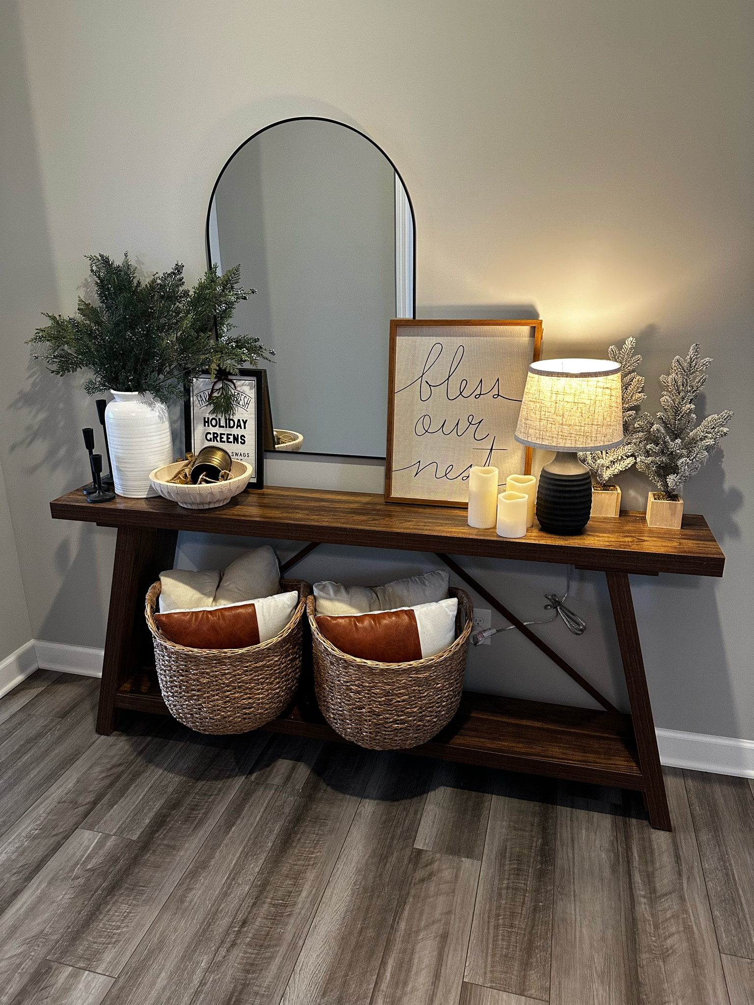 My cozy holiday entry table! Love a mirror by the door to check your outfit or fix your hair on the way out the door. The table lamp adds so much coziness to our home. We will switch out the Christmas decor but leave most of this up through winter. 

#LTKSeasonal #LTKHoliday #LTKHome