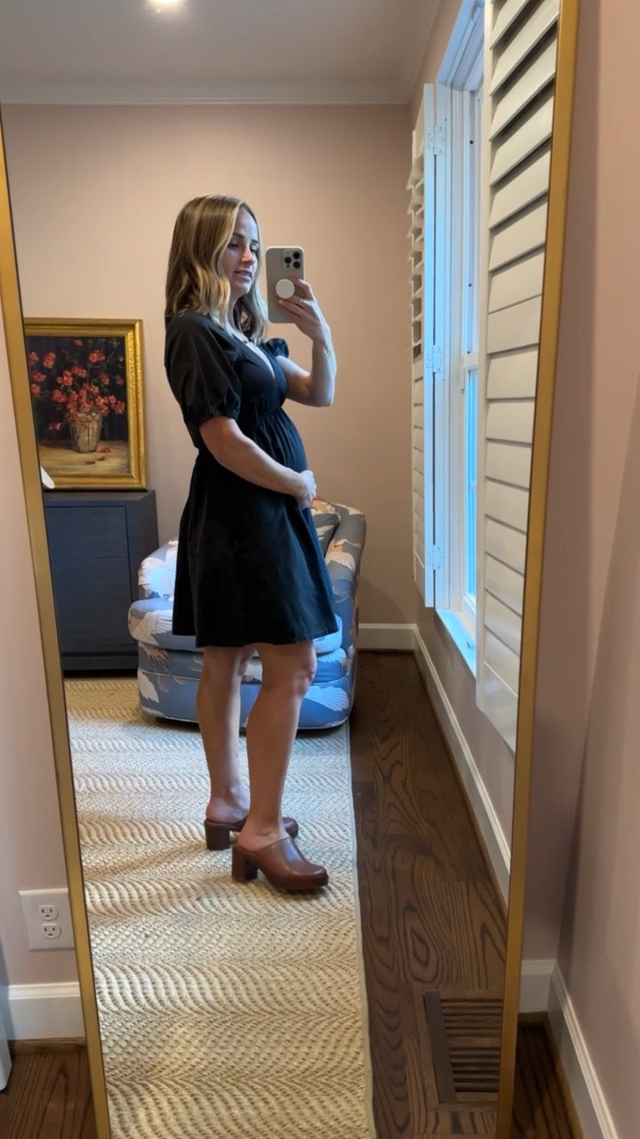 This black Madewell dress is SO cute. It would be great for a concert with boots, but it’s also perfect with these Madewell clogs. It’s bump friendly, and has a super cute button up situation in the back. #madewell
