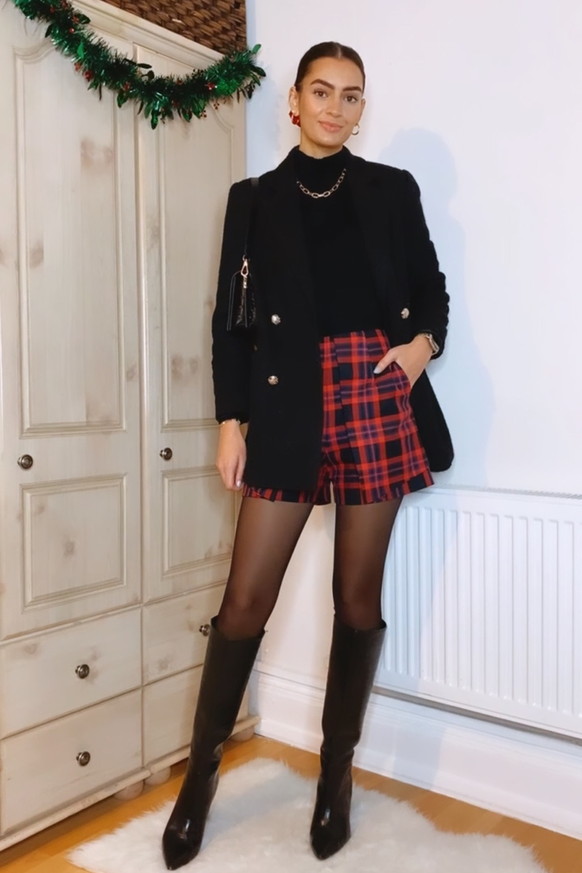 Black blazer, high neck jumper, red check shorts, sheer tights, knee high boots, crossbody bag

#LTKstyletip #LTKHoliday #LTKSeasonal
