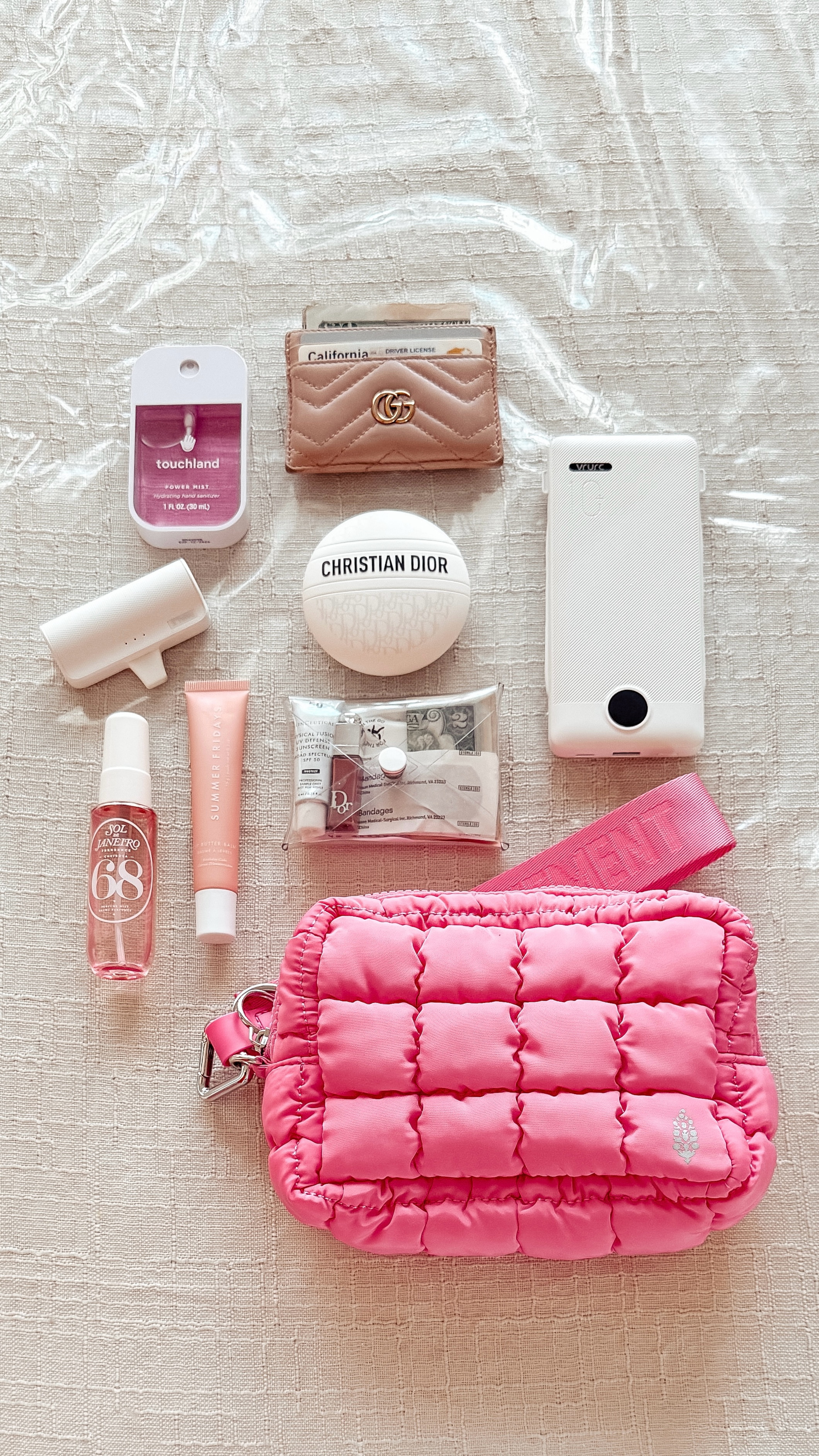 { disneyland essentials ❥

• Touchland Power Mist Hydrating Hand Sanitizer in Berry Bliss 
• GUCCI Card Holder 
• iWalk Portable iPhone Charger 
• Dior Le Baume Revitalizing Multi-Purpose Balm
• VRURC Portable Charger 
• Sol de Janeiro 68
• Summer Fridays Limited Edition Lip Butter Balm in Birthday Cake 
• Clear Pouch 
• fp movement Quilted Mini Case + There It Is Keychain  

WIMB . Travel Bag . Ulta Beauty . Native American Content Creator } 

#LTKBeauty #LTKSpringSale #LTKTravel